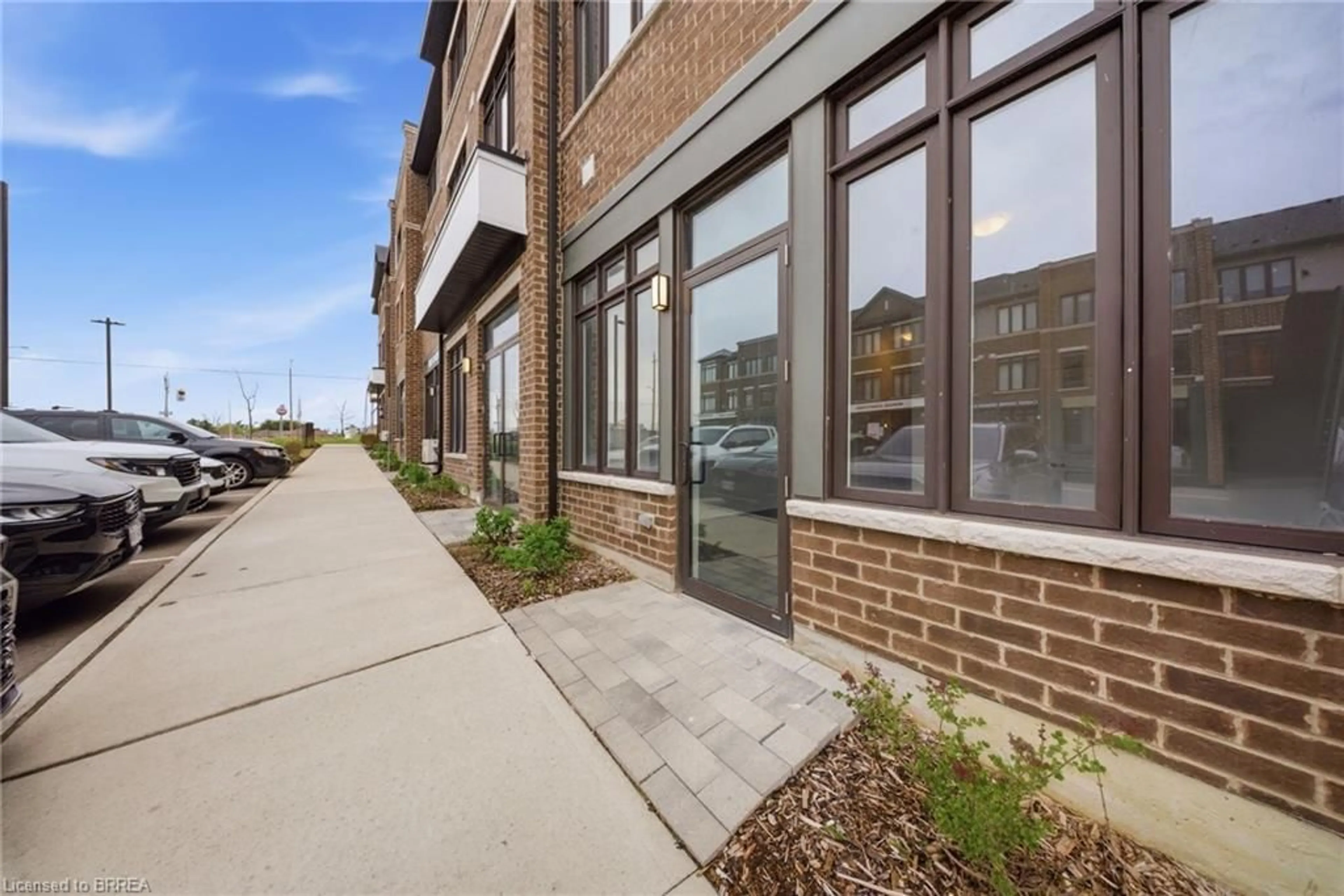Home with brick exterior material, street for 585 Colborne St #107, Brantford Ontario N3S 0K4