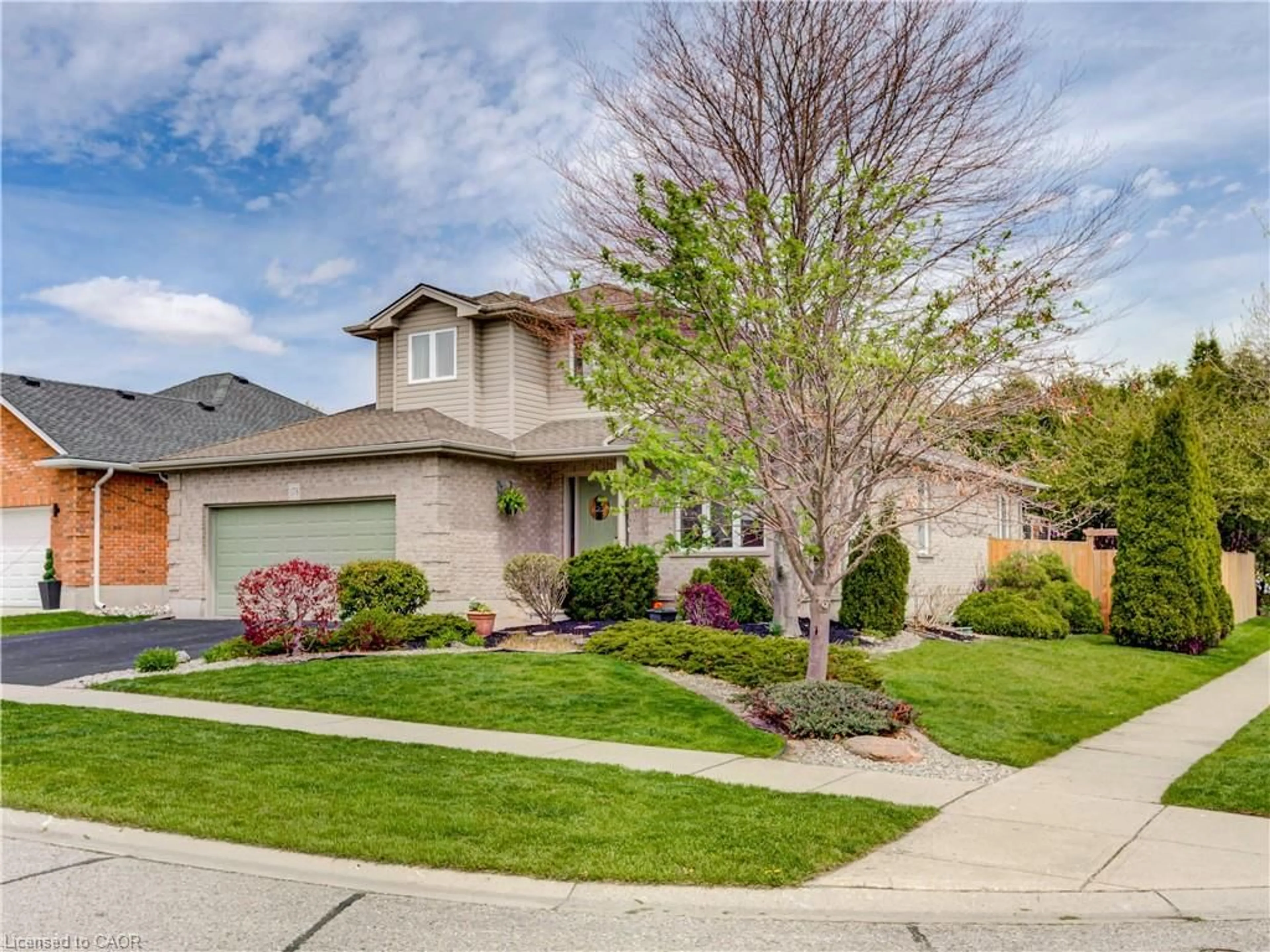 Home with brick exterior material, street for 175 Kingfisher Ave, Woodstock Ontario N4T 1T6