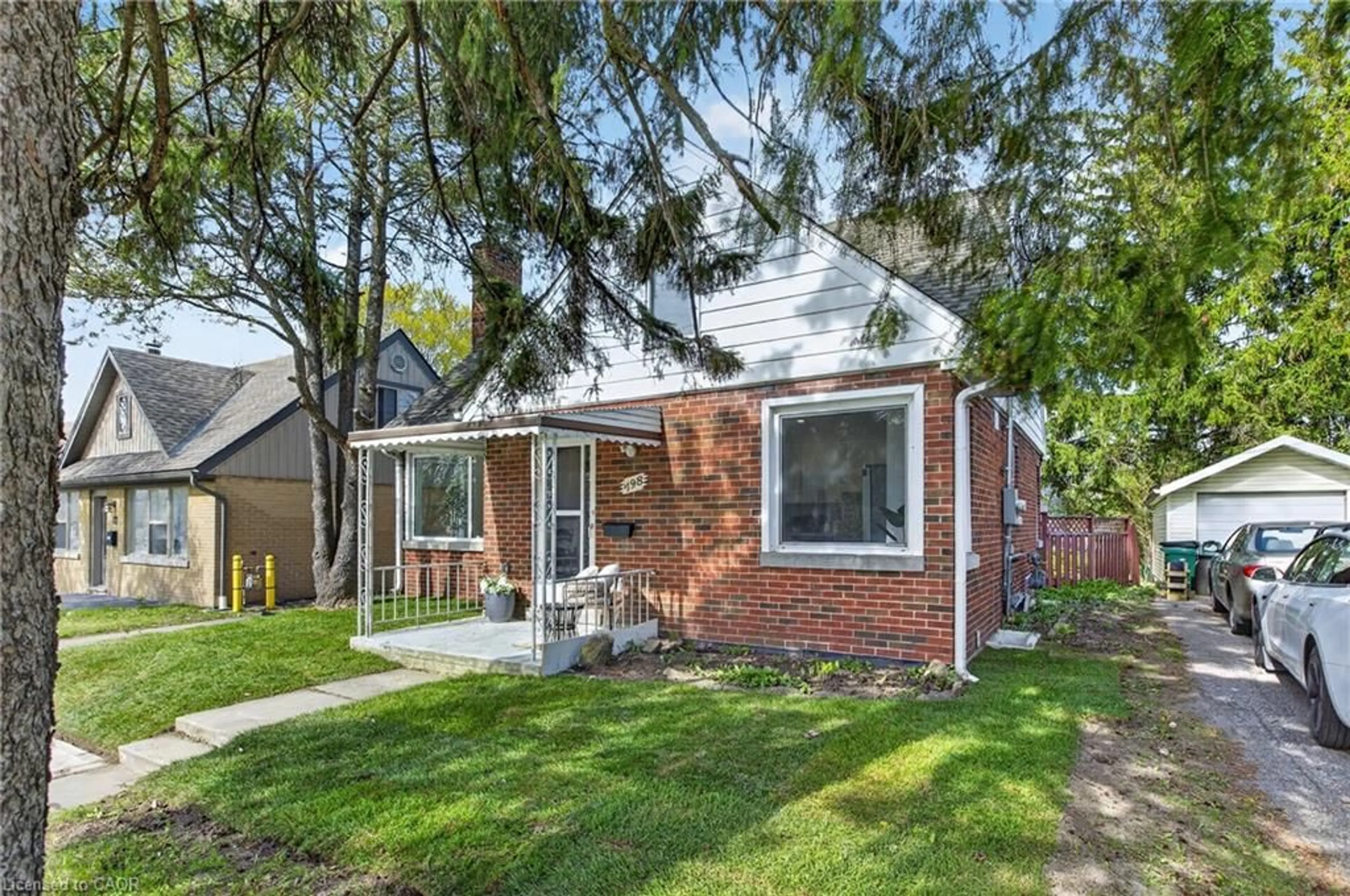 Home with brick exterior material, street for 198 Highland Rd, Kitchener Ontario N2M 3W2
