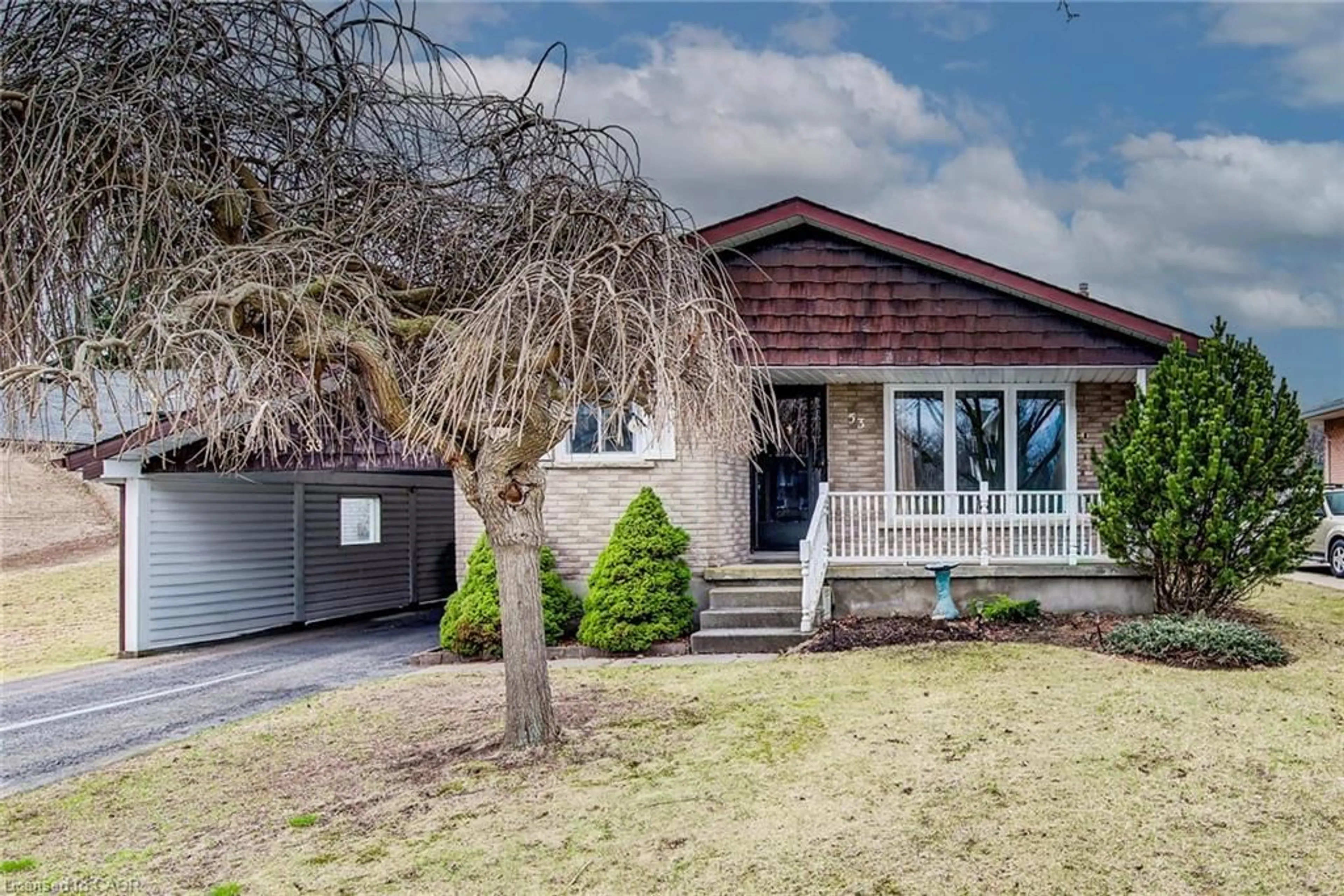Home with vinyl exterior material, street for 53 Greenock Dr, Kitchener Ontario N2E 2J9
