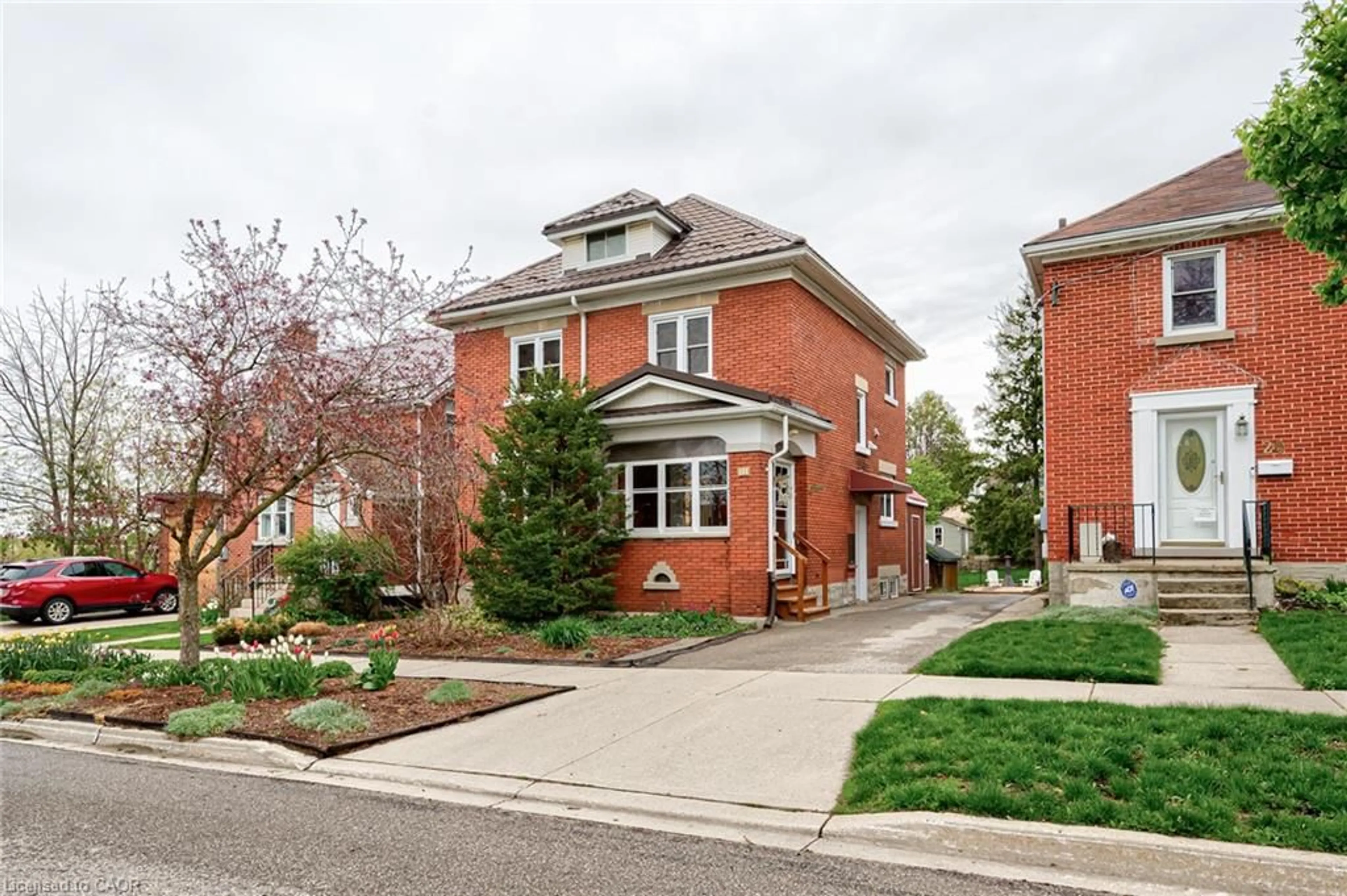 Home with brick exterior material, street for 16 Borden Ave, Kitchener Ontario N2H 3J1