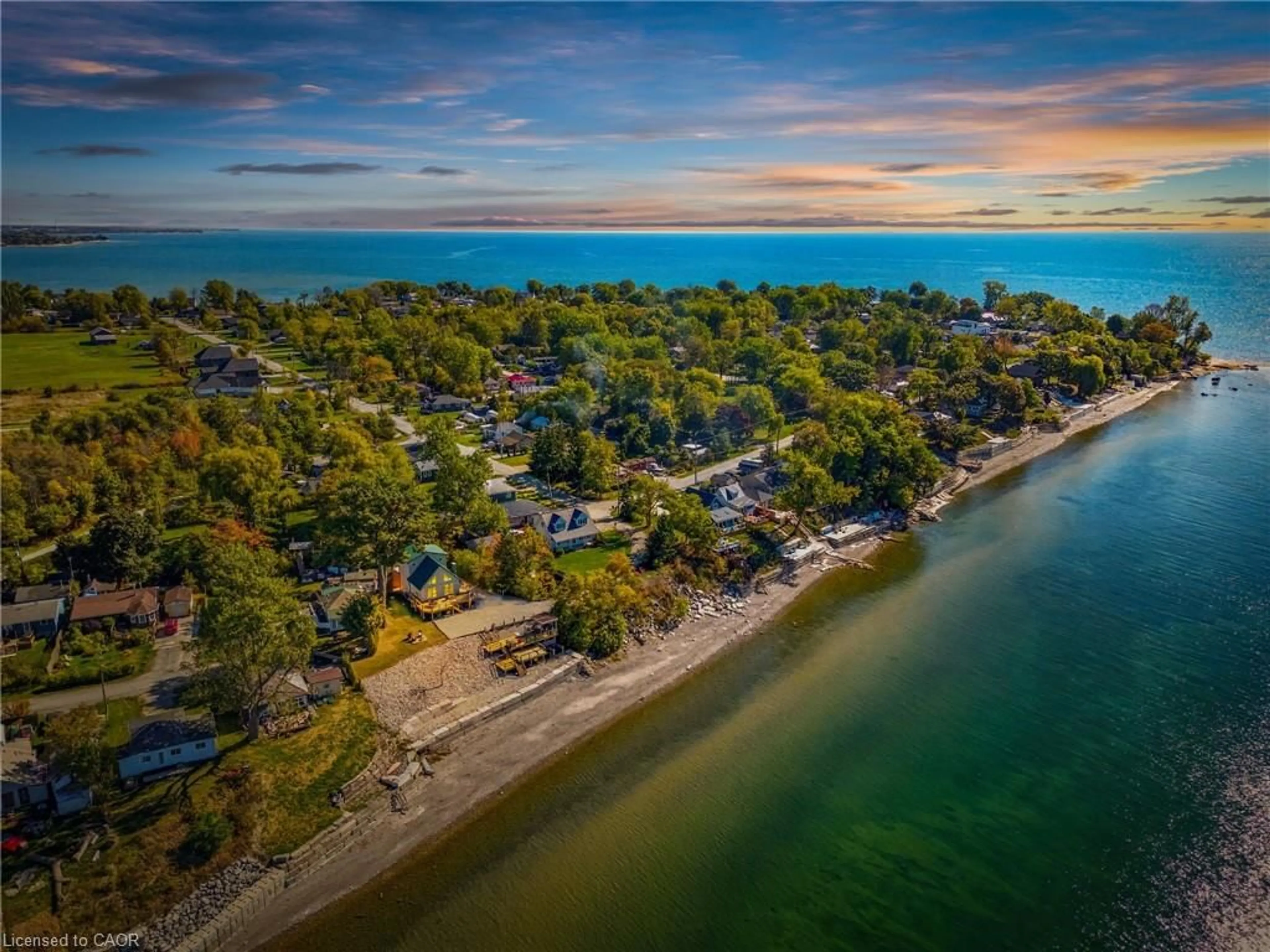 A pic from outside/outdoor area/front of a property/back of a property/a pic from drone, water/lake/river/ocean view for 13 Sunset Dr, Nanticoke Ontario N0A 1L0