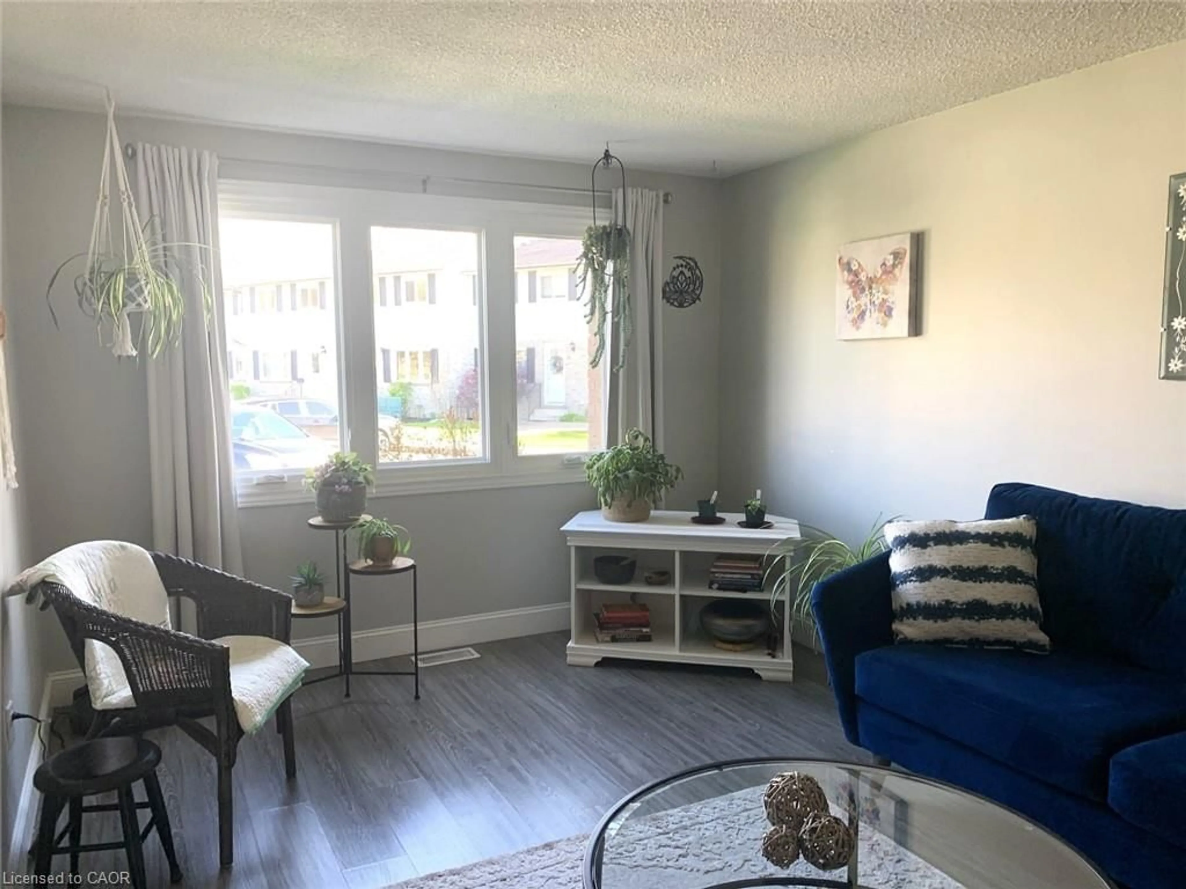 Living room with furniture, wood/laminate floor for 244 Richardson Dr #U13, Port Dover Ontario N0A 1N4