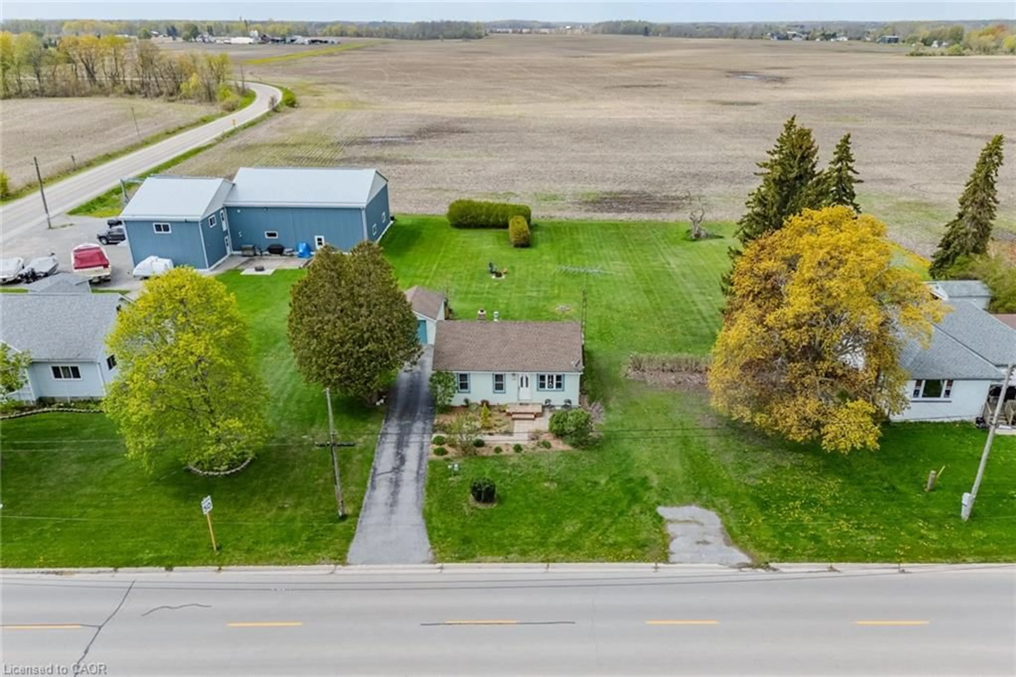 A pic from outside/outdoor area/front of a property/back of a property/a pic from drone, water/lake/river/ocean view for 125 Townline St, St. Williams Ontario N0E 1P0