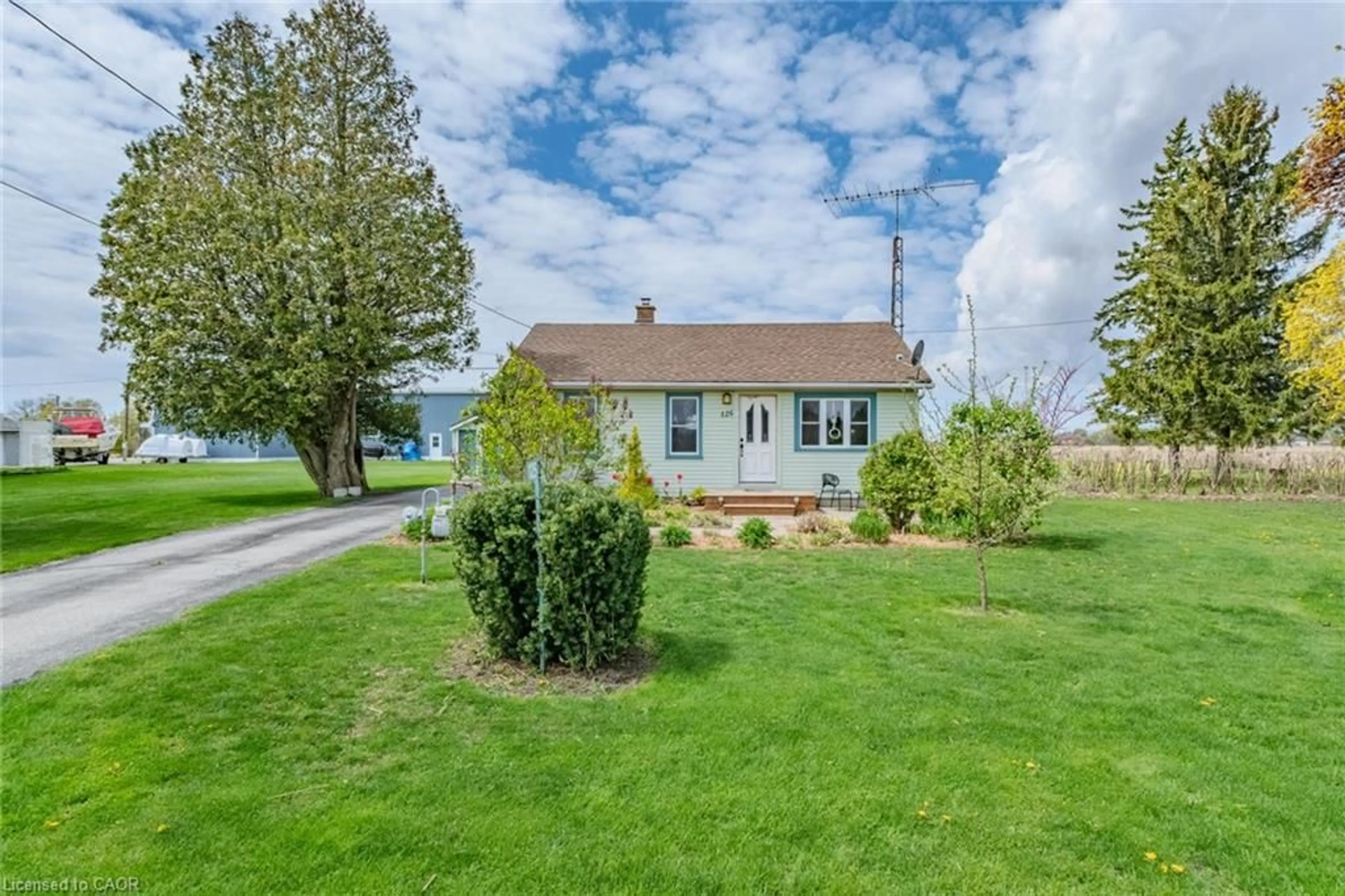 A pic from outside/outdoor area/front of a property/back of a property/a pic from drone, street for 125 Townline St, St. Williams Ontario N0E 1P0