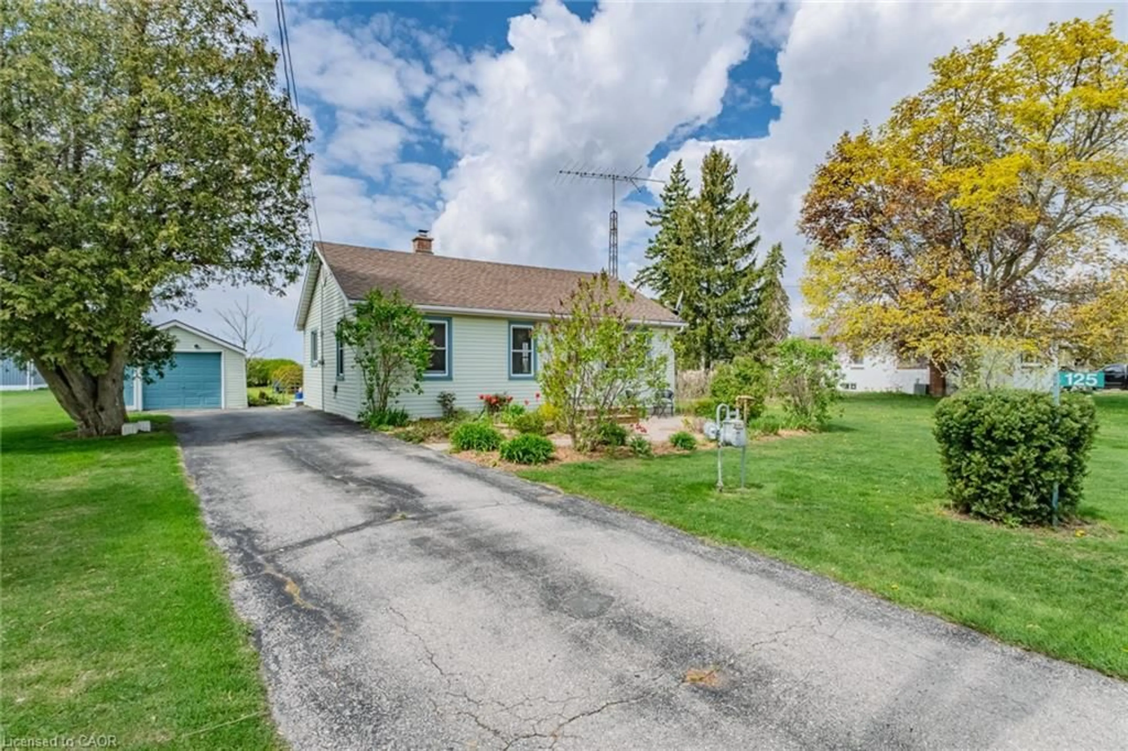 A pic from outside/outdoor area/front of a property/back of a property/a pic from drone, street for 125 Townline St, St. Williams Ontario N0E 1P0
