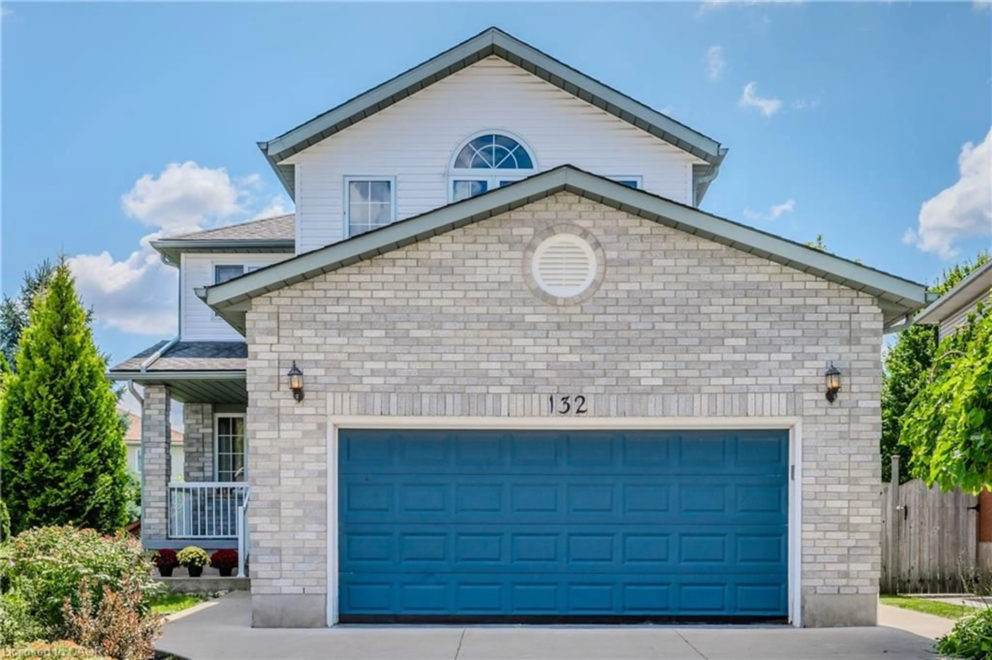 Home with brick exterior material, street for 132 Daimler Dr, Kitchener Ontario N2A 4C2