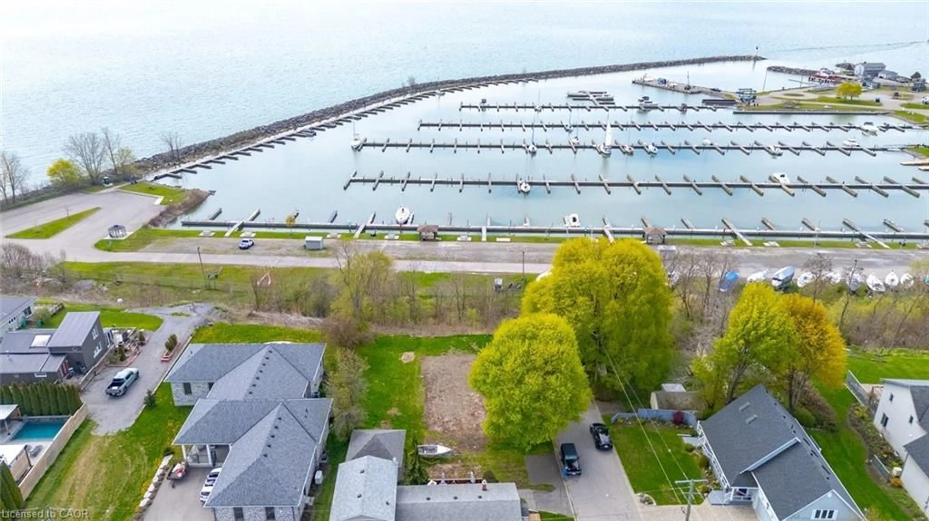 A pic from outside/outdoor area/front of a property/back of a property/a pic from drone, water/lake/river/ocean view for 2039 Erie St, Port Dover Ontario N0A 1N7