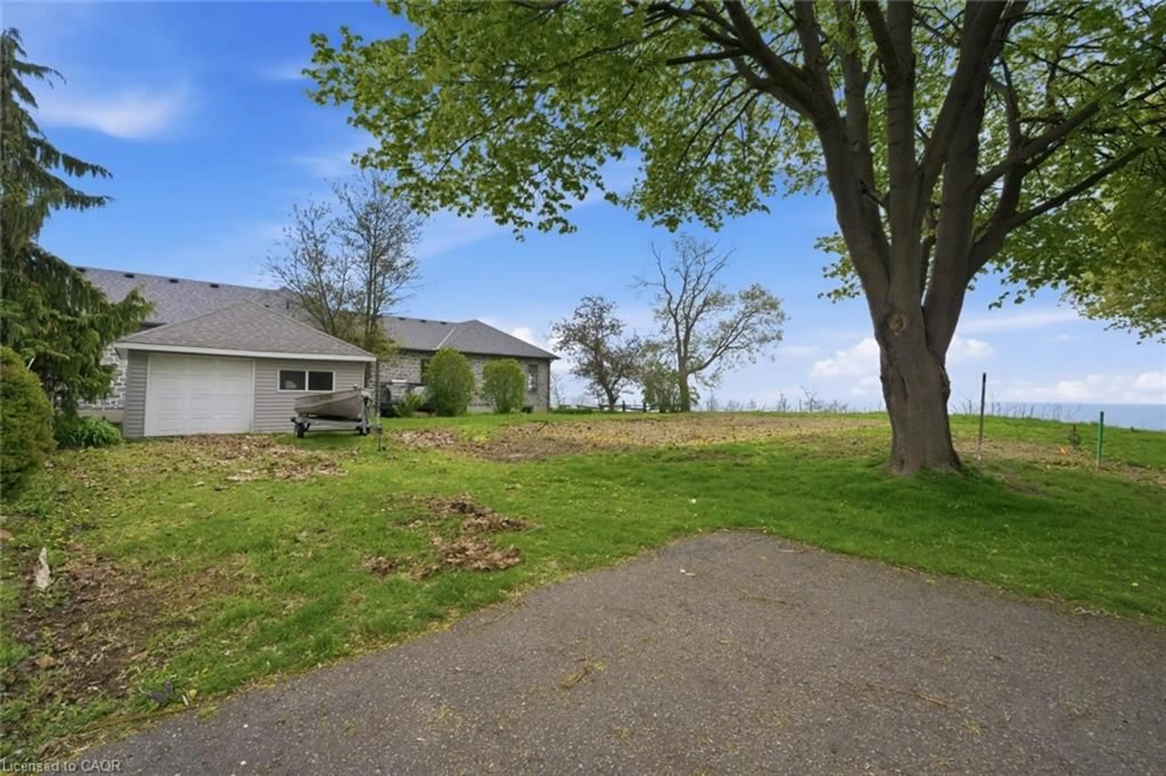 A pic from outside/outdoor area/front of a property/back of a property/a pic from drone, unknown for 2039 Erie St, Port Dover Ontario N0A 1N7