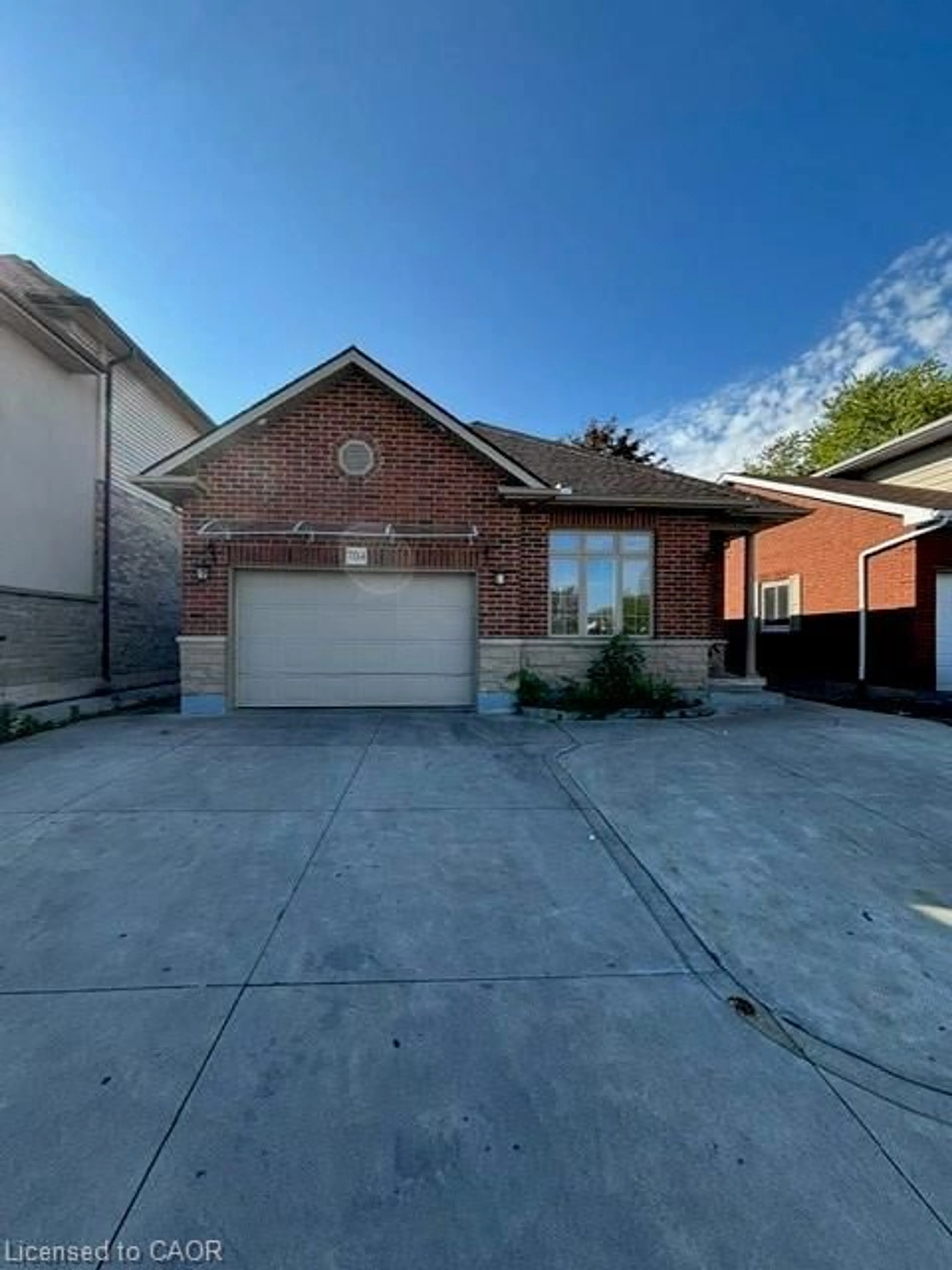 Home with brick exterior material, street for 704 Stone Church Rd, Hamilton Ontario L8W 1A7