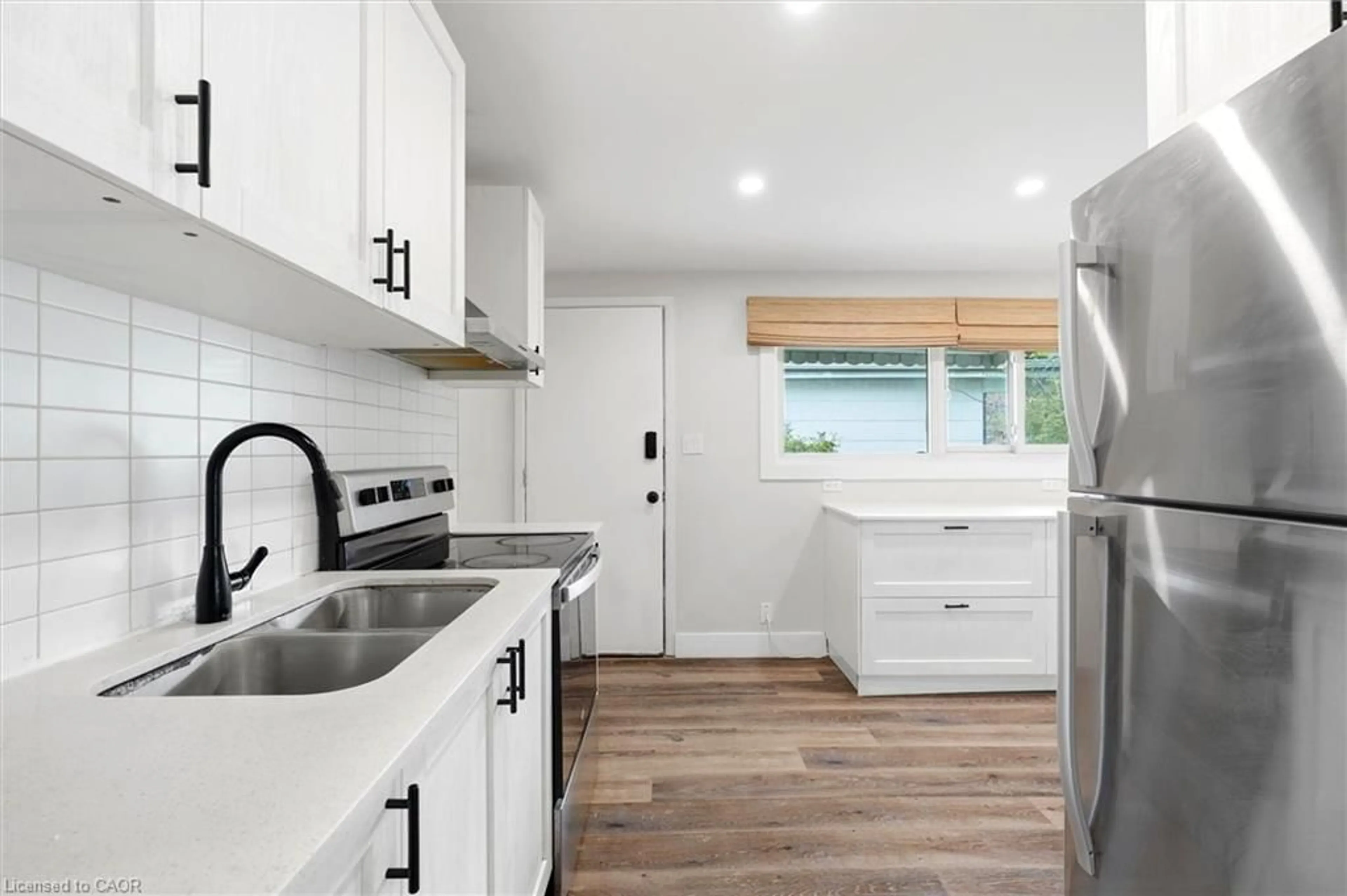 Open concept kitchen, unknown for 16 Ronaldshay Ave, Hamilton Ontario L9A 3B1