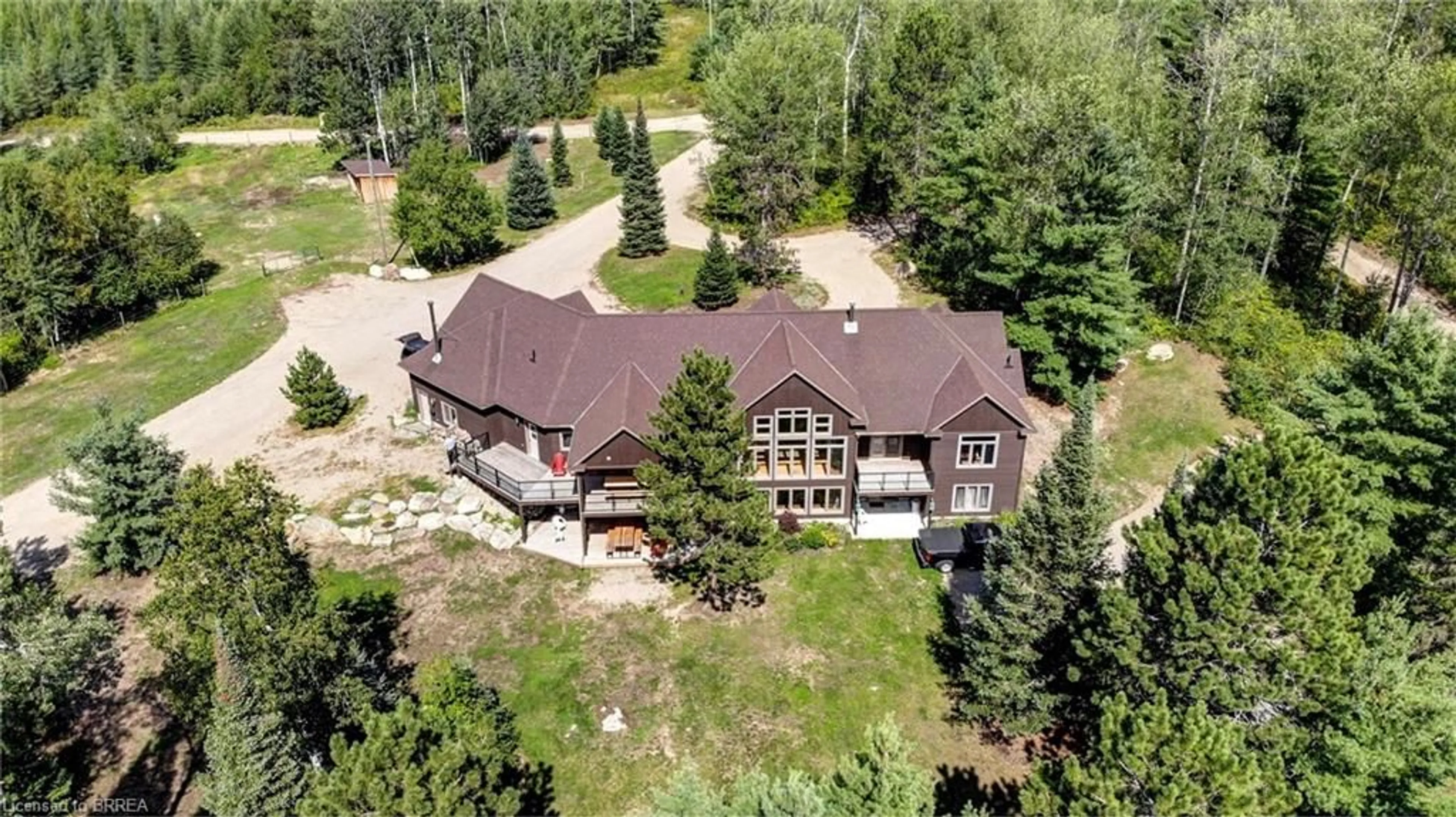 A pic from outside/outdoor area/front of a property/back of a property/a pic from drone, mountain view for 6605 #523 Hwy, Madawaska Ontario K0J 2C0