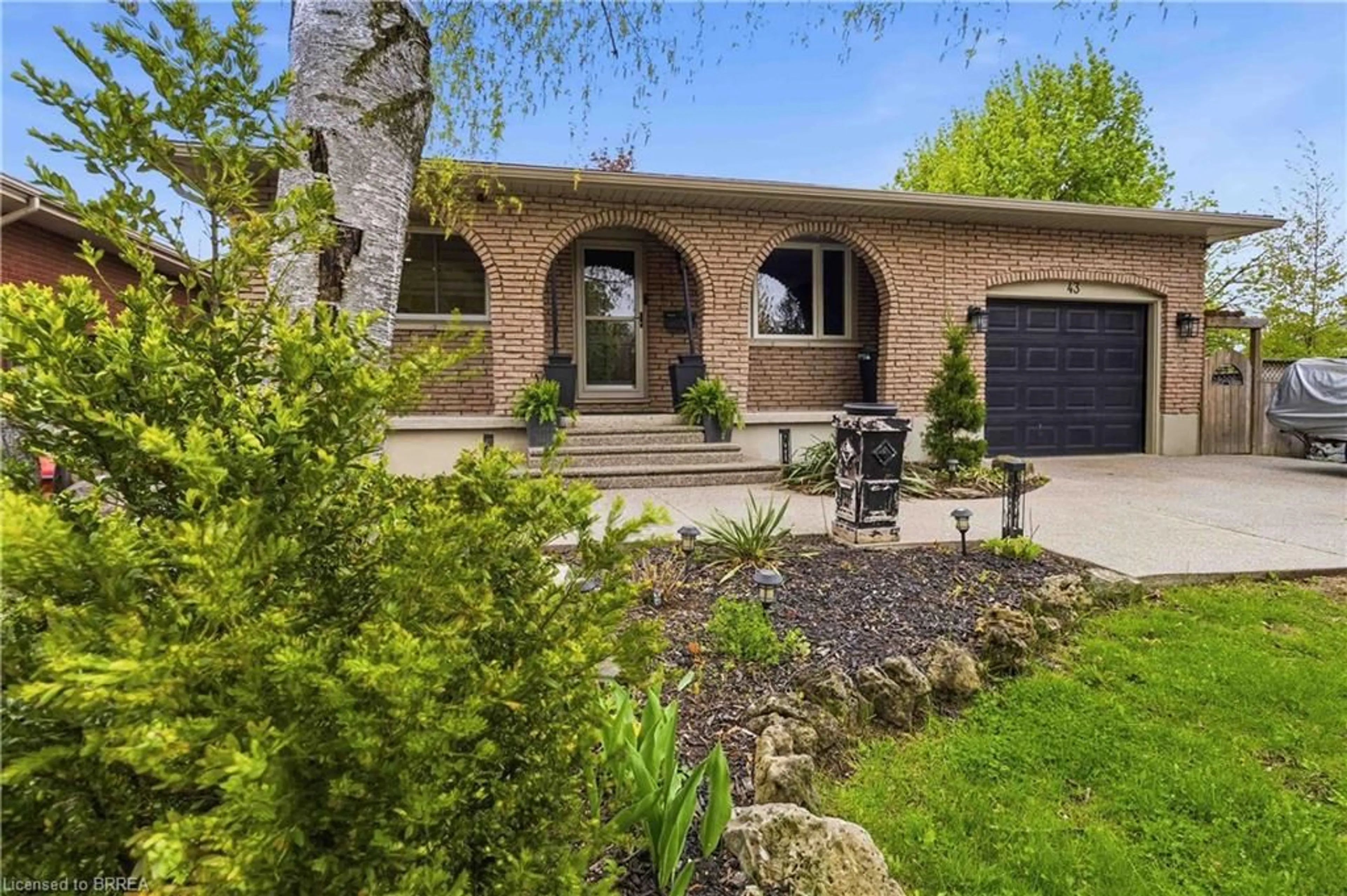 Home with brick exterior material, street for 43 Brisbane Blvd, Brantford Ontario N3S 4K9