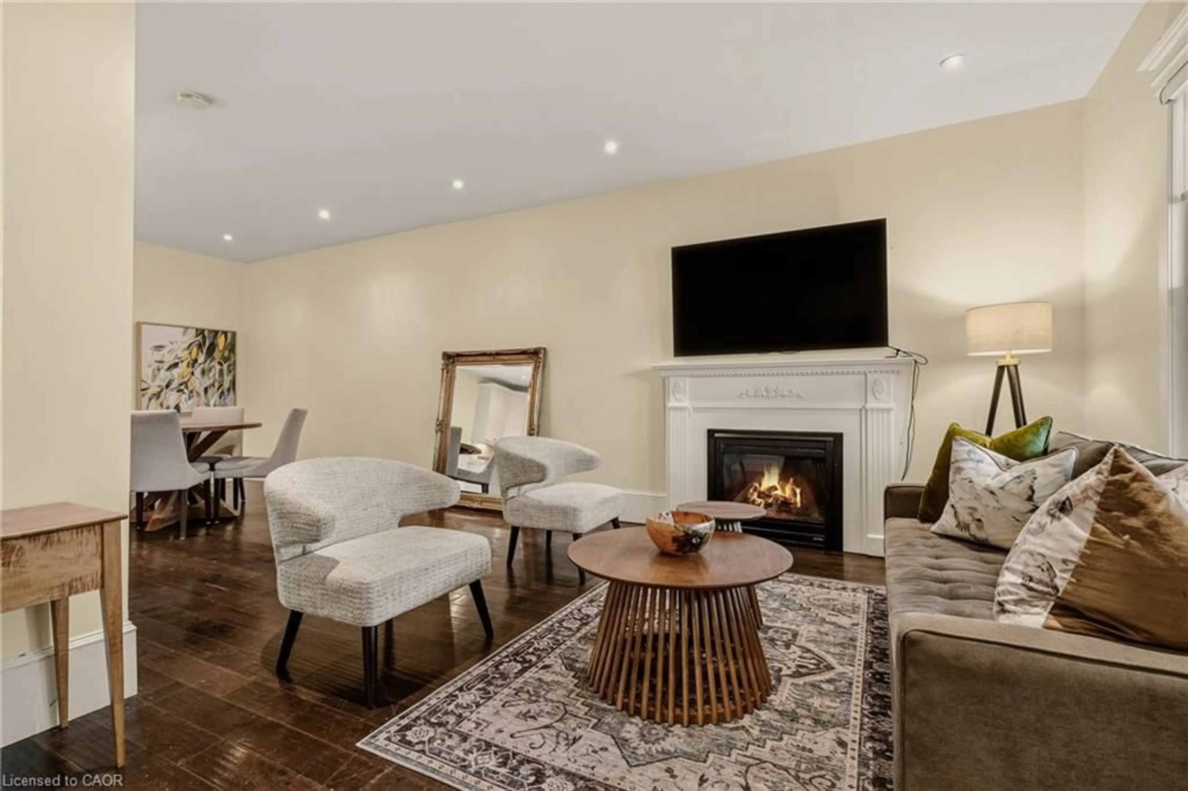 Living room with furniture, wood/laminate floor for 104 Barnesdale Ave, Hamilton Ontario L8L 6S5