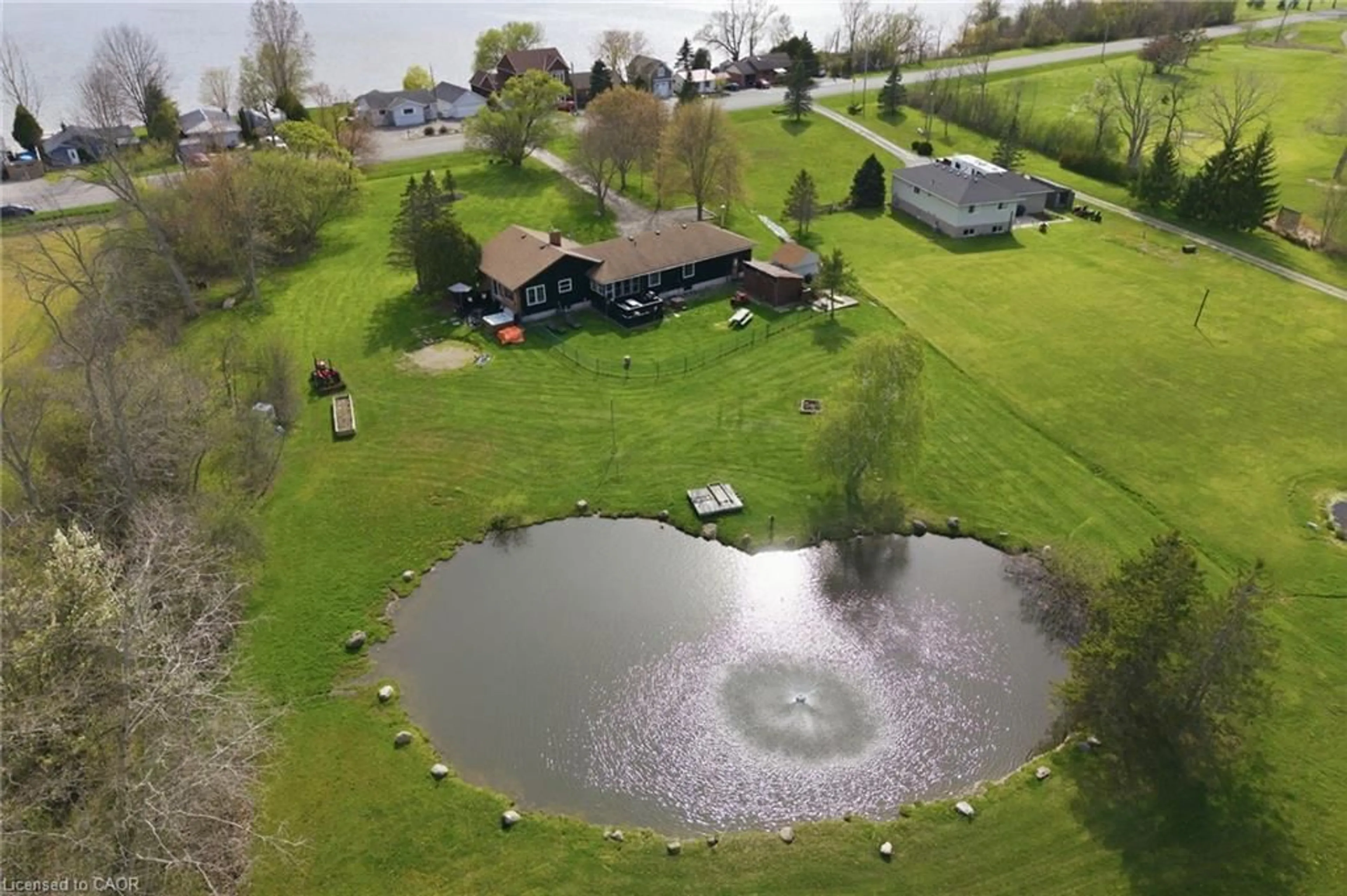 A pic from outside/outdoor area/front of a property/back of a property/a pic from drone, water/lake/river/ocean view for 116 Haldimand Road 17, Dunnville Ontario N1A 2W4