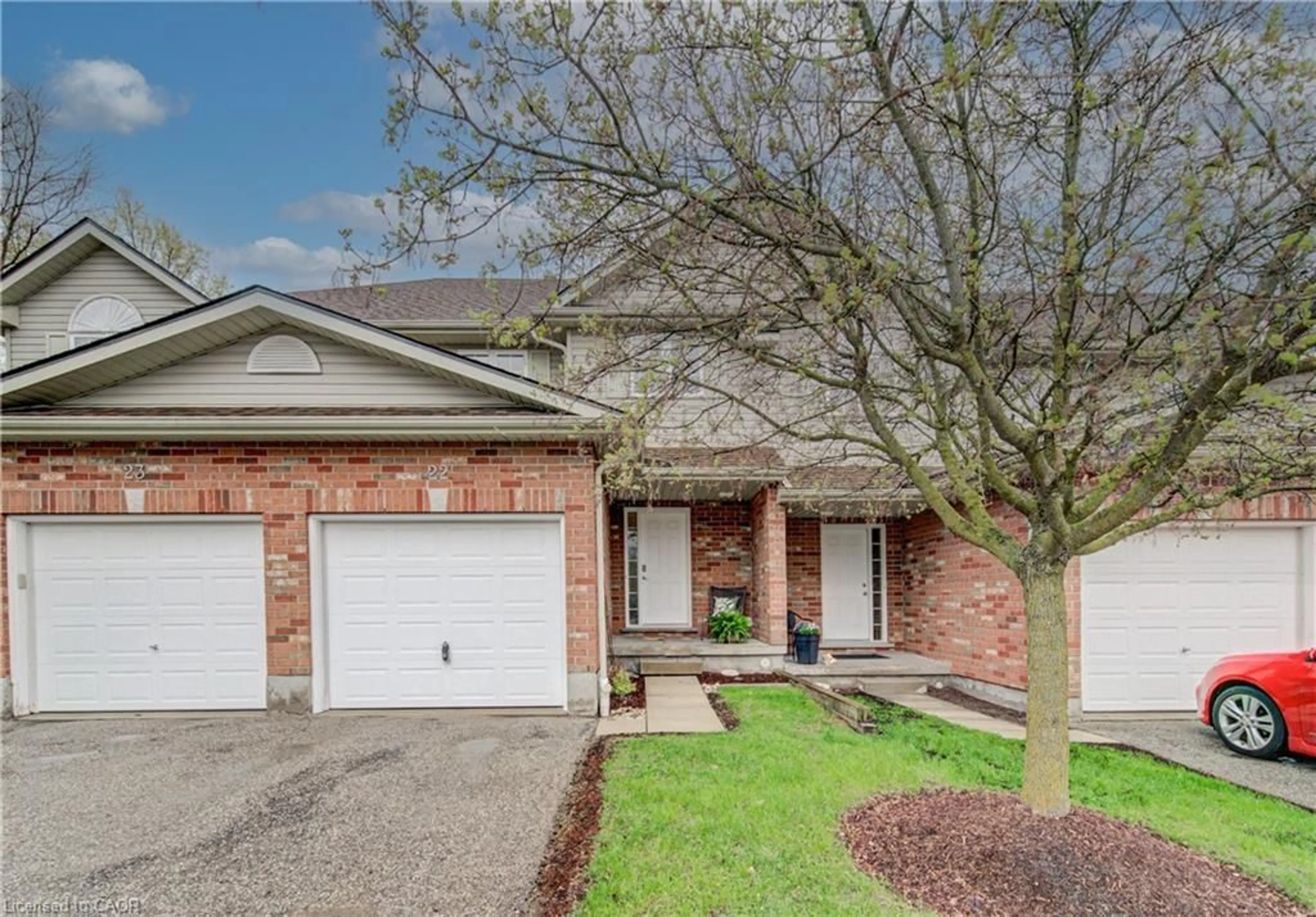 Home with brick exterior material, street for 42 Fallowfield Dr #22, Kitchener Ontario N2C 0A8