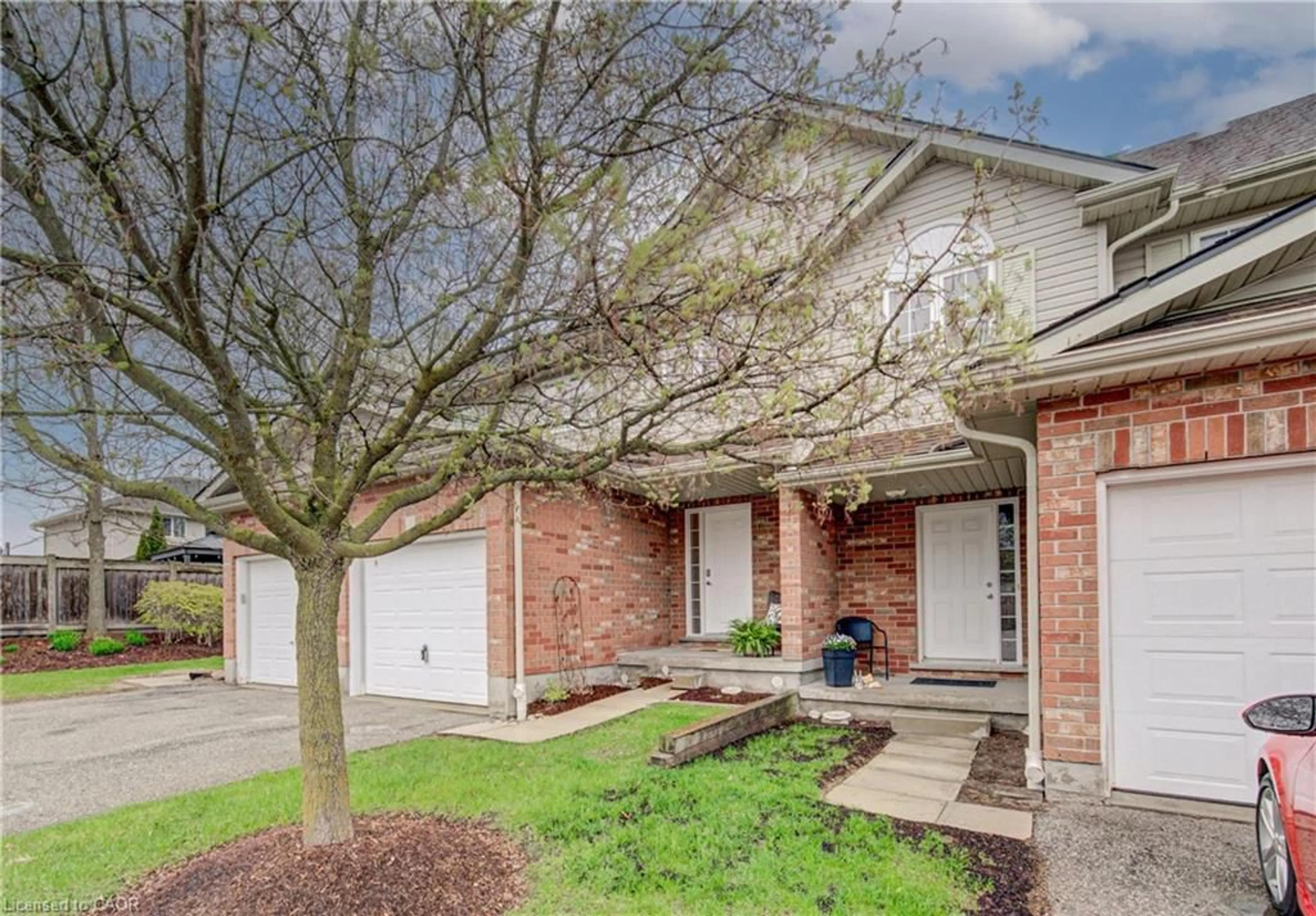 Home with brick exterior material, street for 42 Fallowfield Dr #22, Kitchener Ontario N2C 0A8