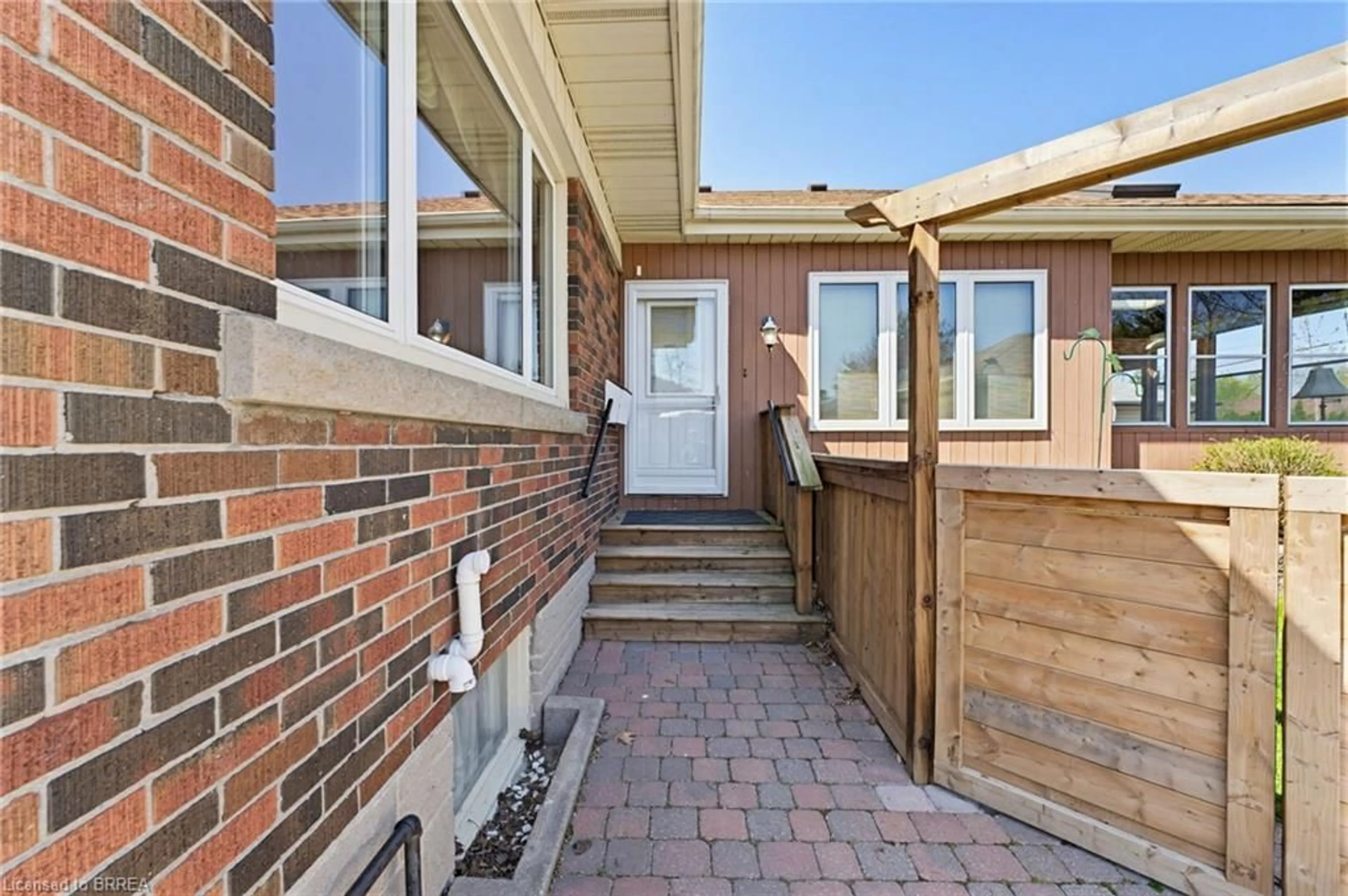 Home with brick exterior material, street for 90 Henderson Ave, Brantford Ontario N3R 4V9