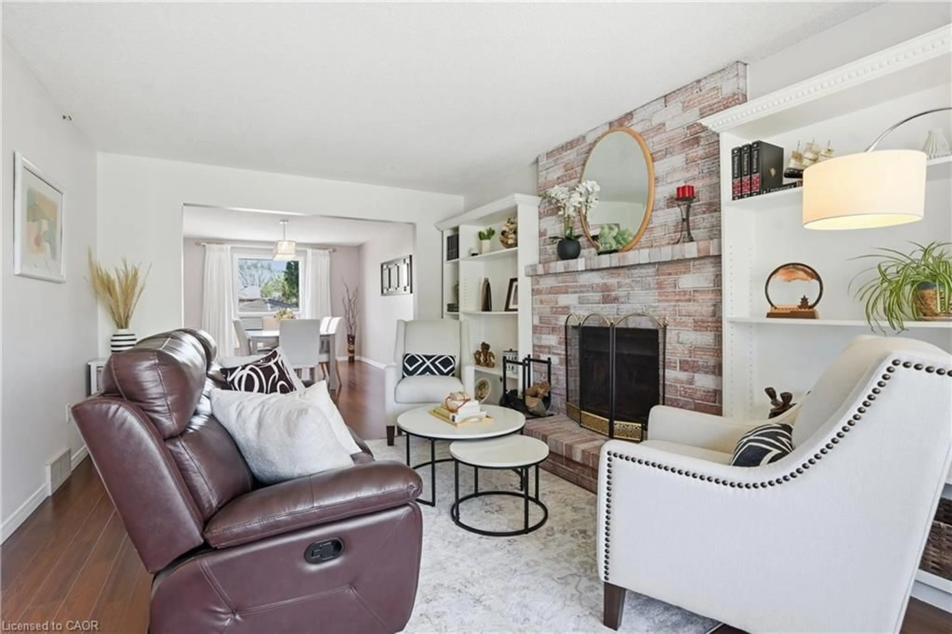 Living room with furniture, ceramic/tile floor for 4582 St Volodymyr Crt, Beamsville Ontario L3J 0B5