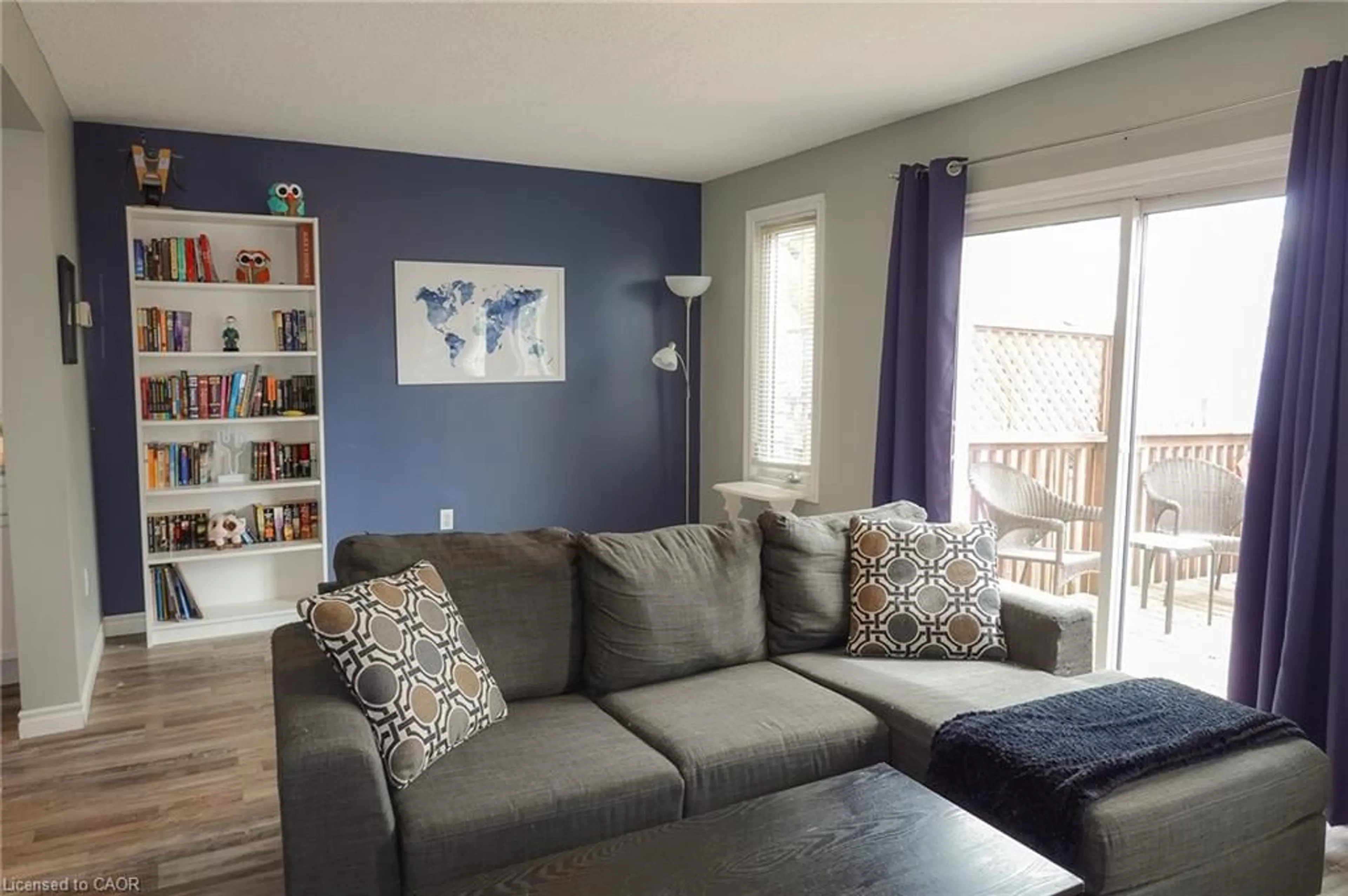 Living room with furniture, wood/laminate floor for 652 Salisbury Ave, Listowel Ontario N4W 1Y9