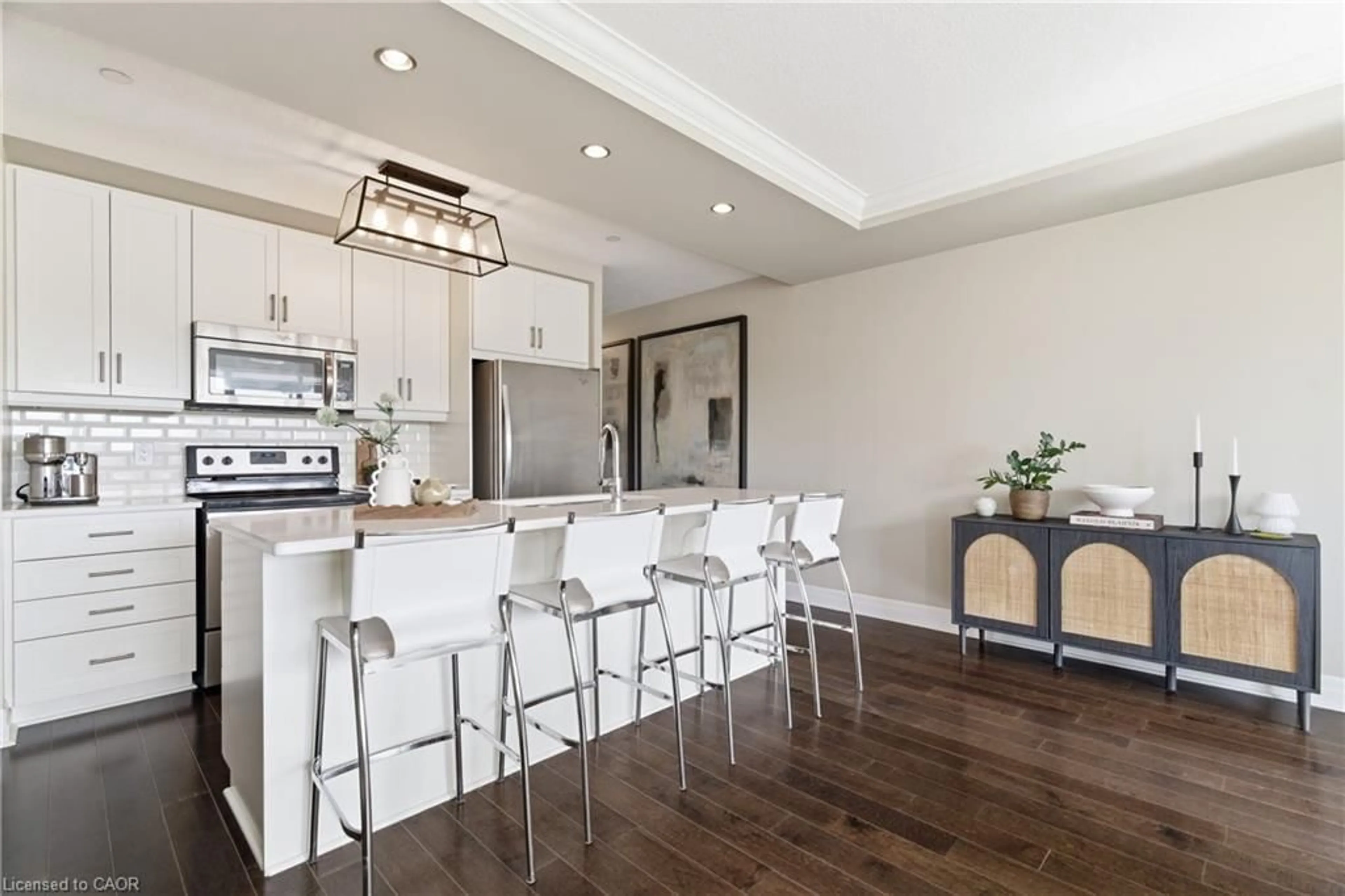 Open concept kitchen, wood/laminate floor for 150 Wellington St #506, Guelph Ontario N1H 0B5