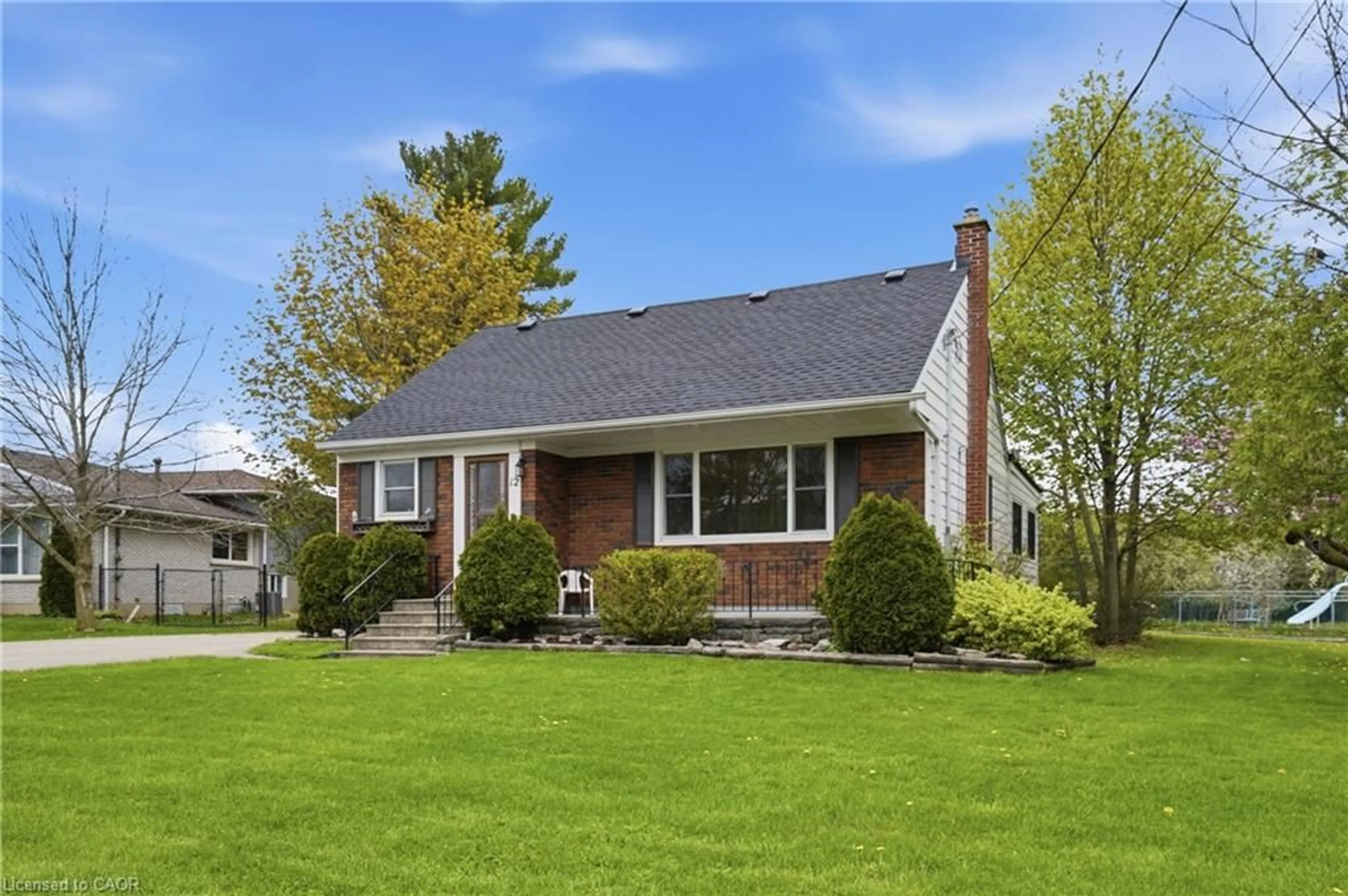 Home with vinyl exterior material, street for 12 Valley Rd, St. Catharines Ontario L2S 1Y6