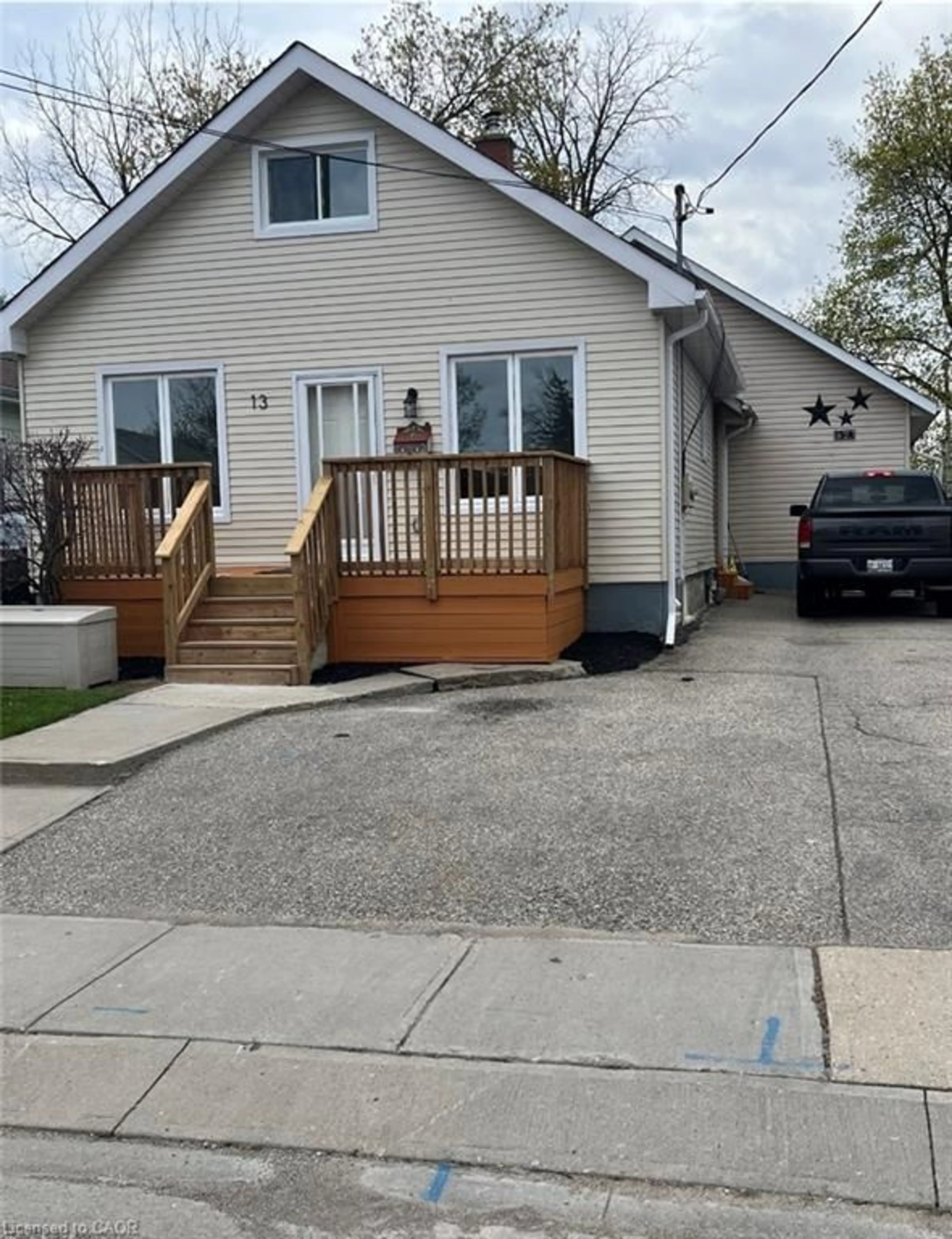 Home with vinyl exterior material, street for 13 Stanley St, Cambridge Ontario N1S 2A5