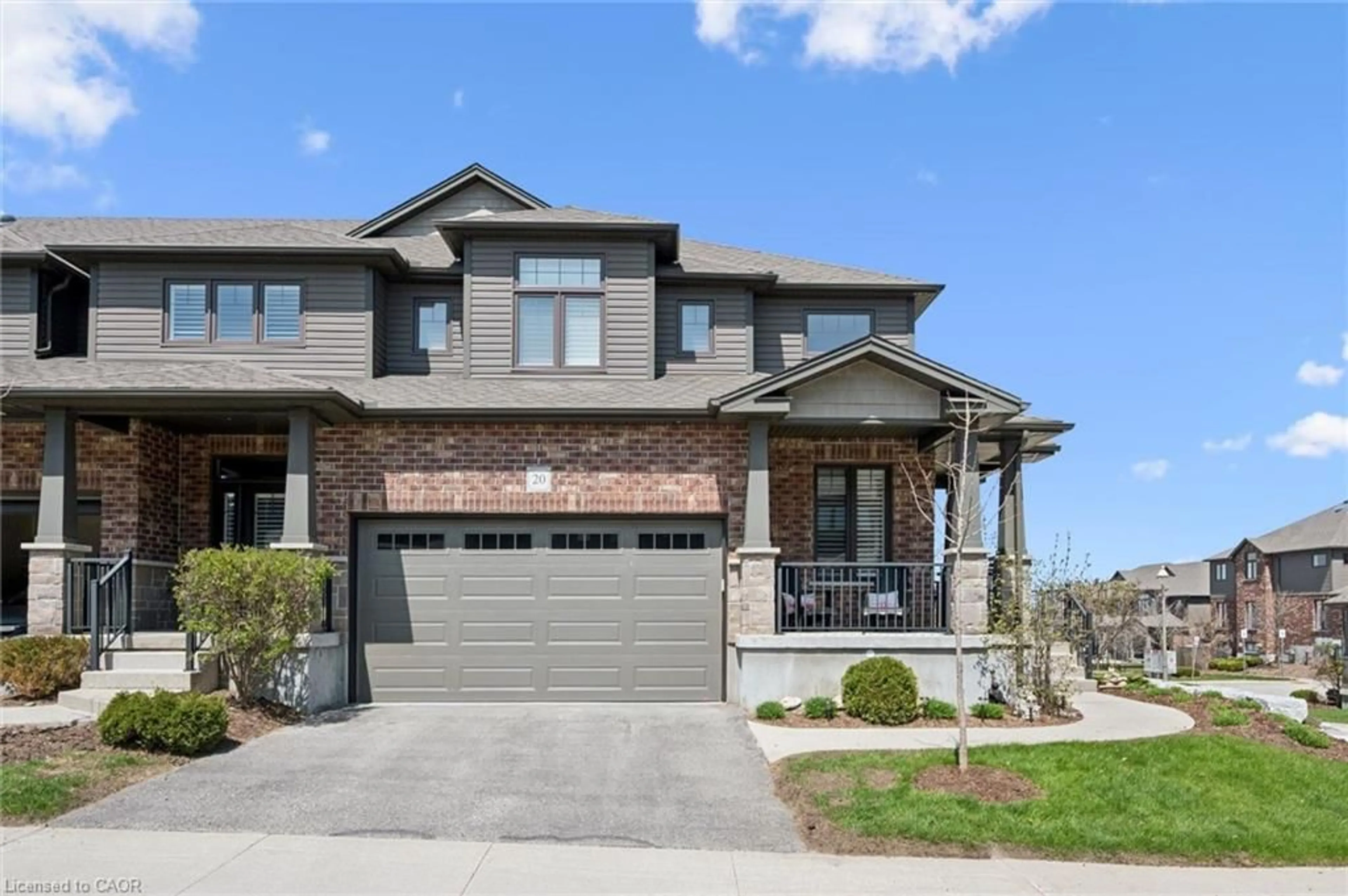 Home with brick exterior material, street for 254 Gosling Gdns #20, Guelph Ontario N1L 1G7