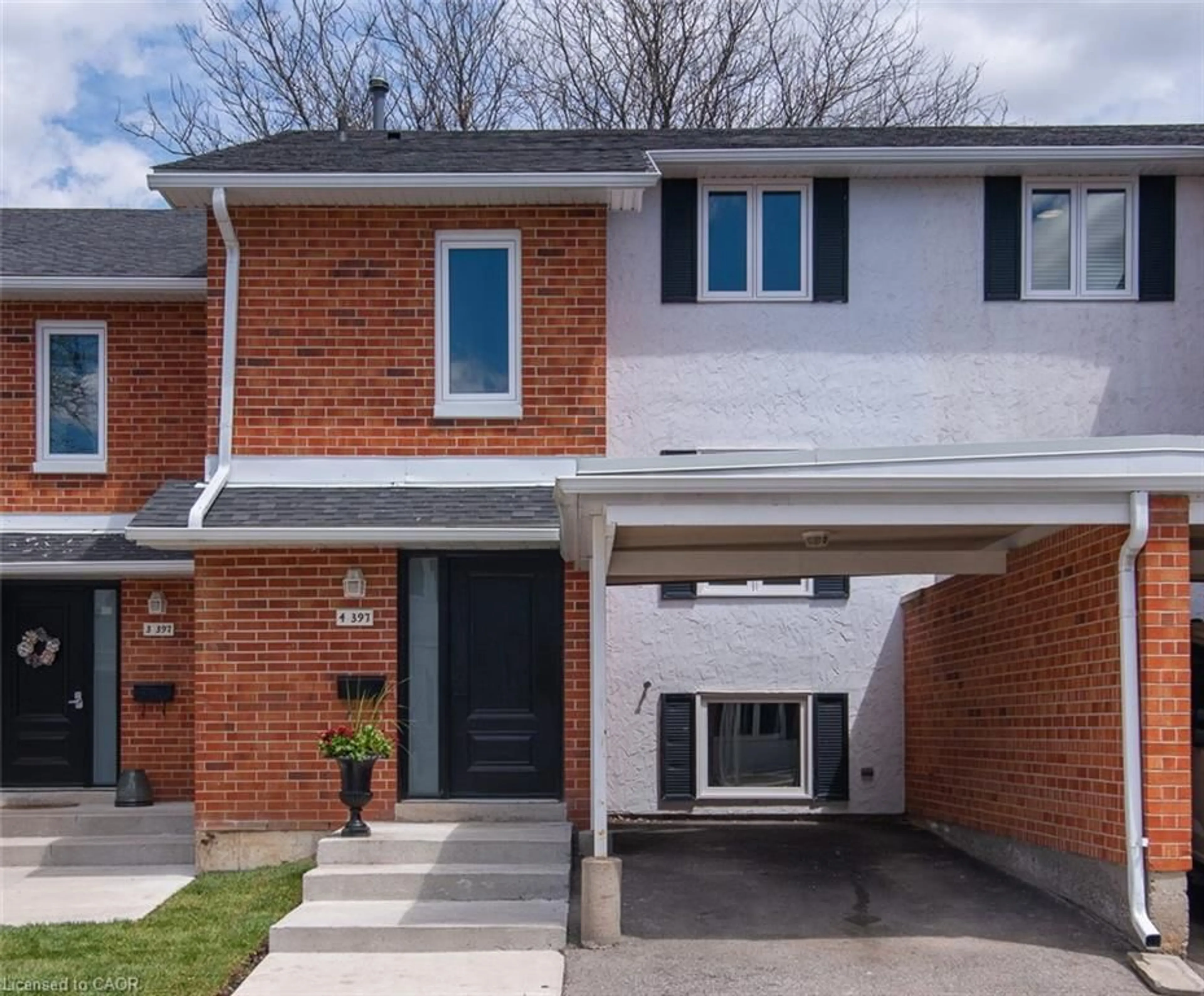 Home with brick exterior material, street for 397 Keats Way #4, Waterloo Ontario N2L 5S7