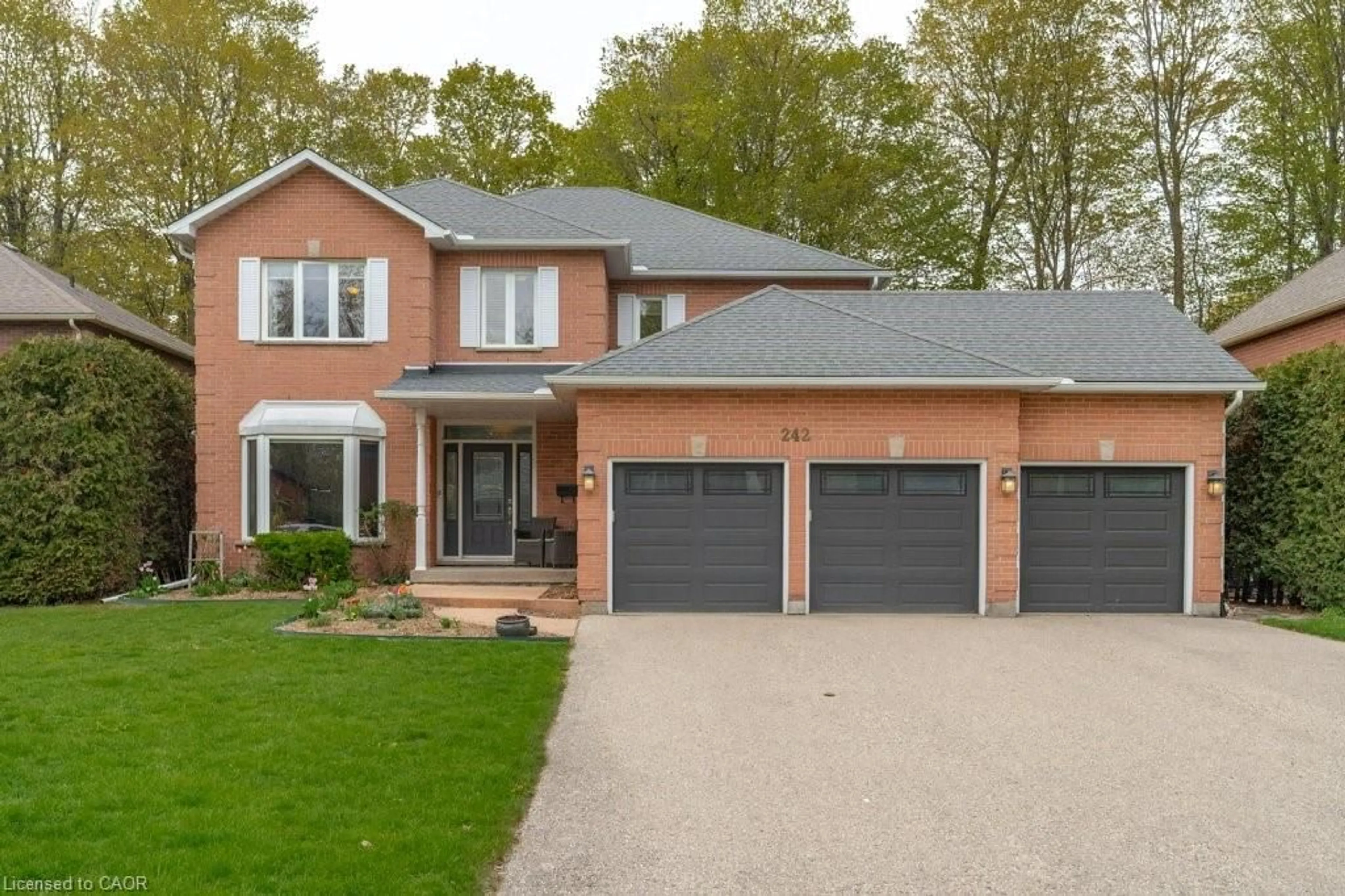 Home with brick exterior material, street for 242 Cheltonwood Cres, Waterloo Ontario N2V 1X9