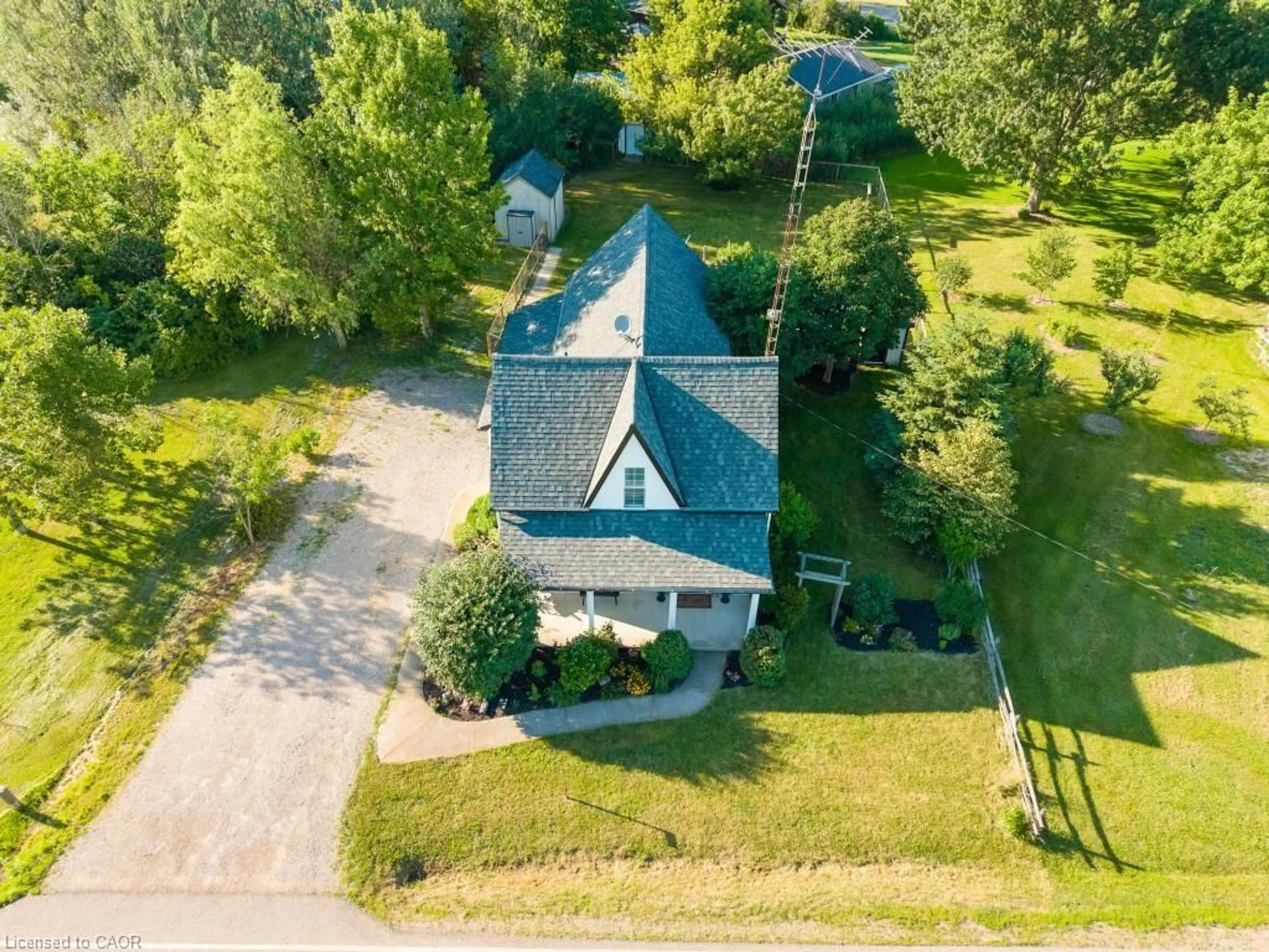 A pic from outside/outdoor area/front of a property/back of a property/a pic from drone, street for 9535 Regional Rd 9, Caistor Centre Ontario N0A 1C0