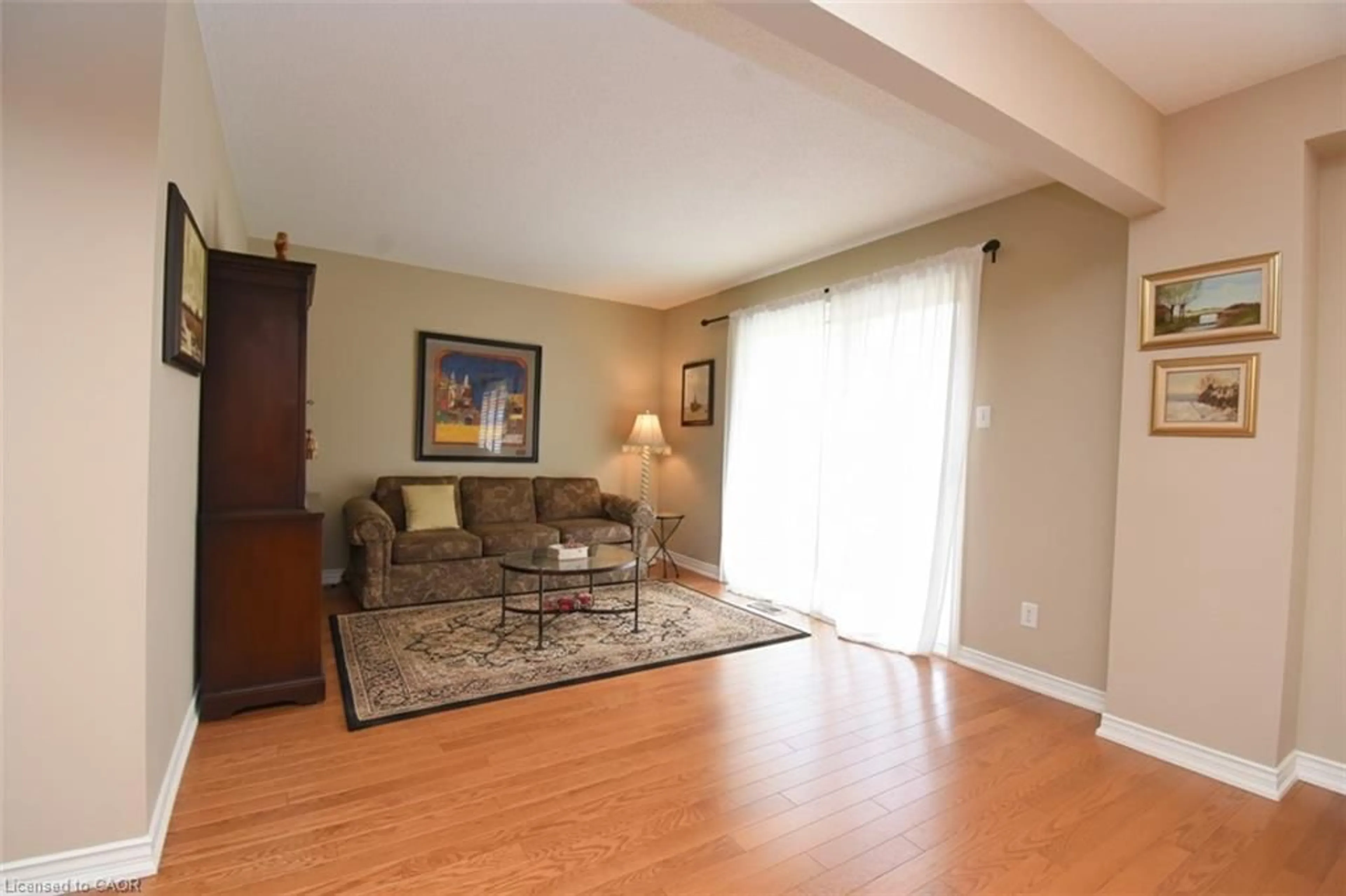 Living room with furniture, unknown for 320 Hamilton Dr #4, Ancaster Ontario L9G 4W6