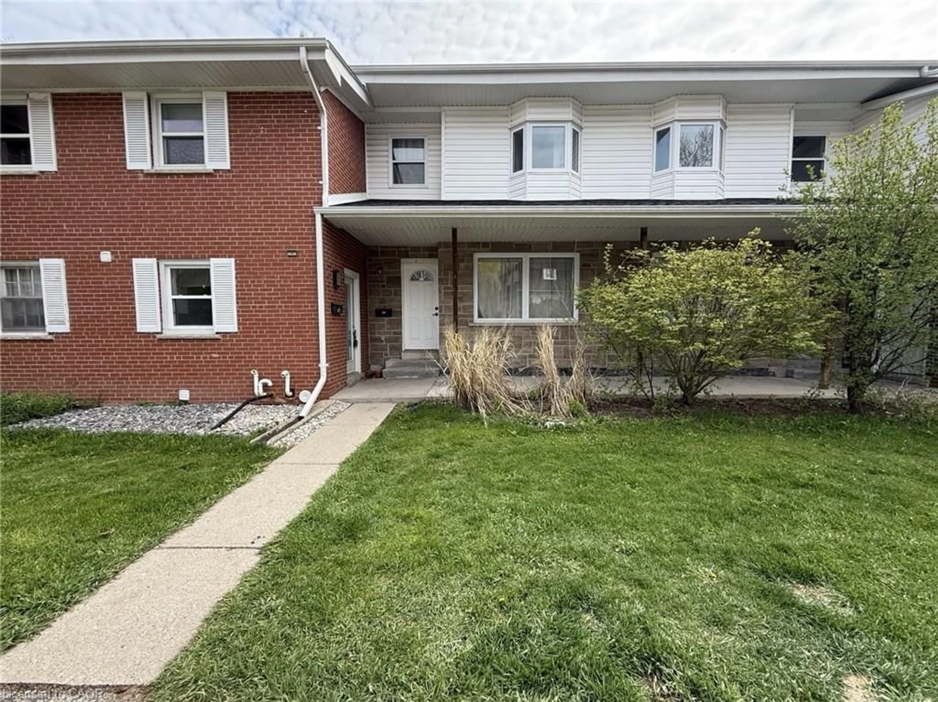 Home with brick exterior material, street for 284 Westcourt Pl, Waterloo Ontario N2L 2R7