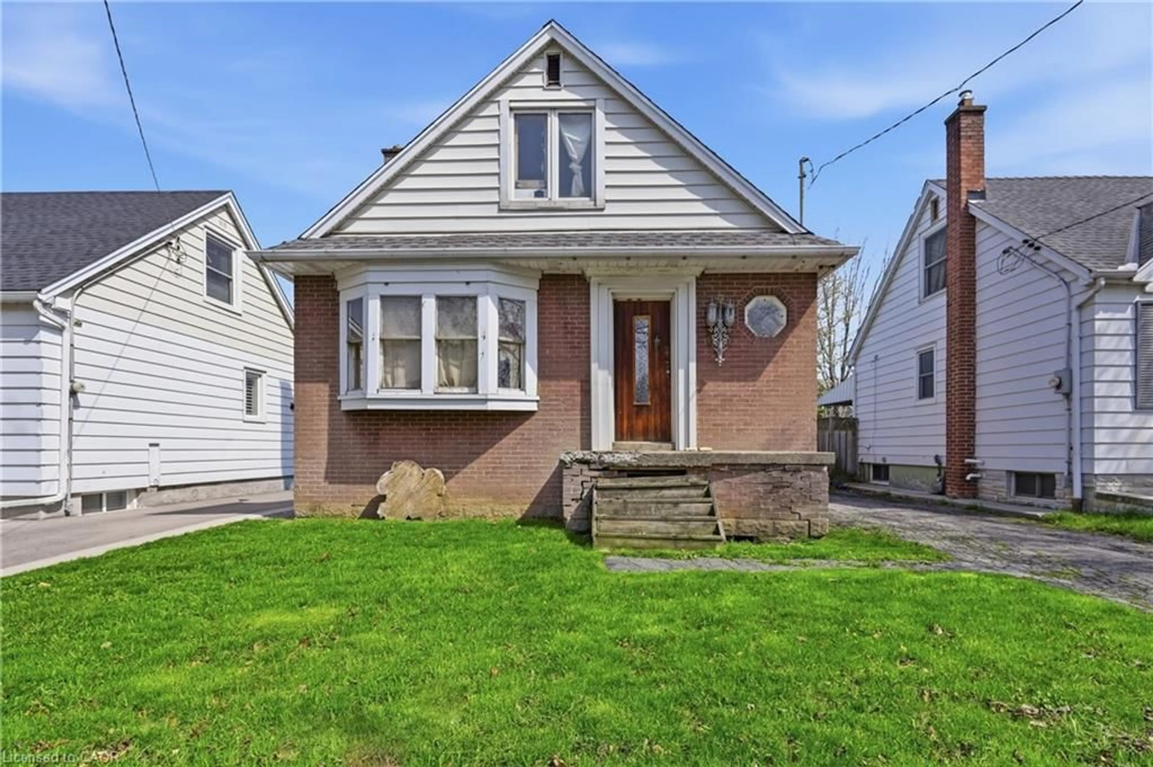 Home with brick exterior material, street for 145 Auburn Ave, Hamilton Ontario L8K 3B3