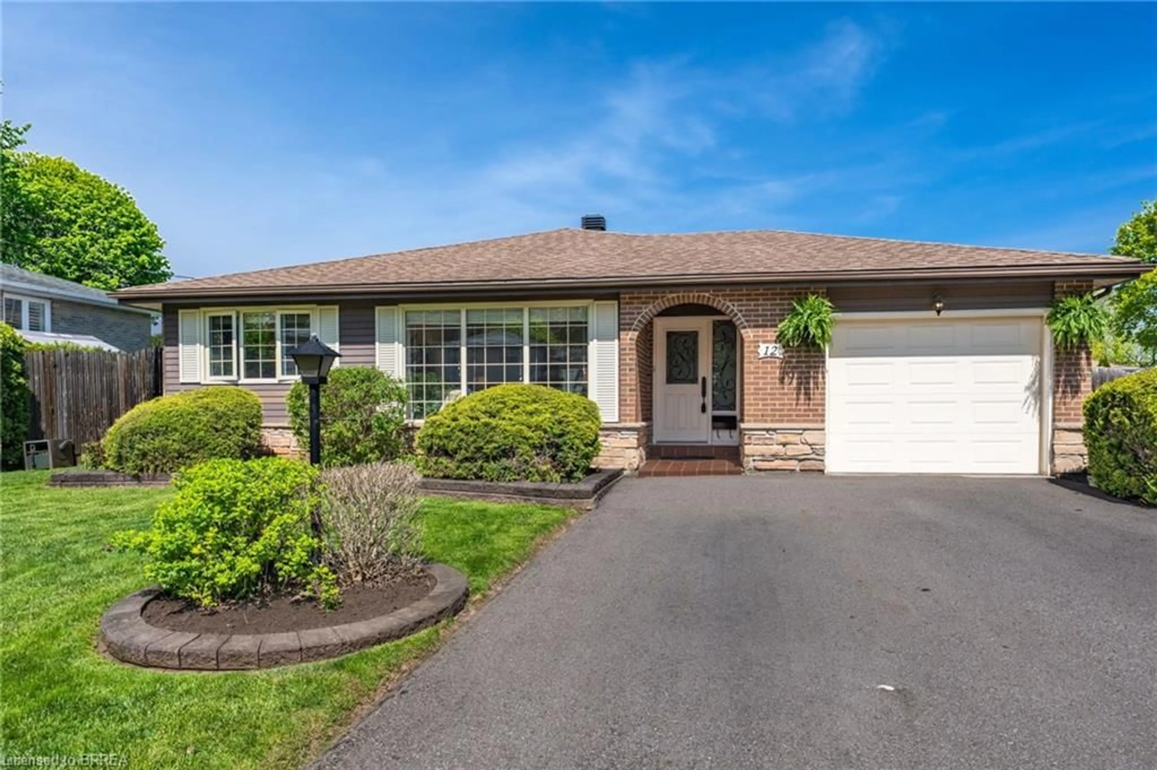 Home with brick exterior material, street for 12 Heather Crt, Georgetown Ontario L7G 2R6