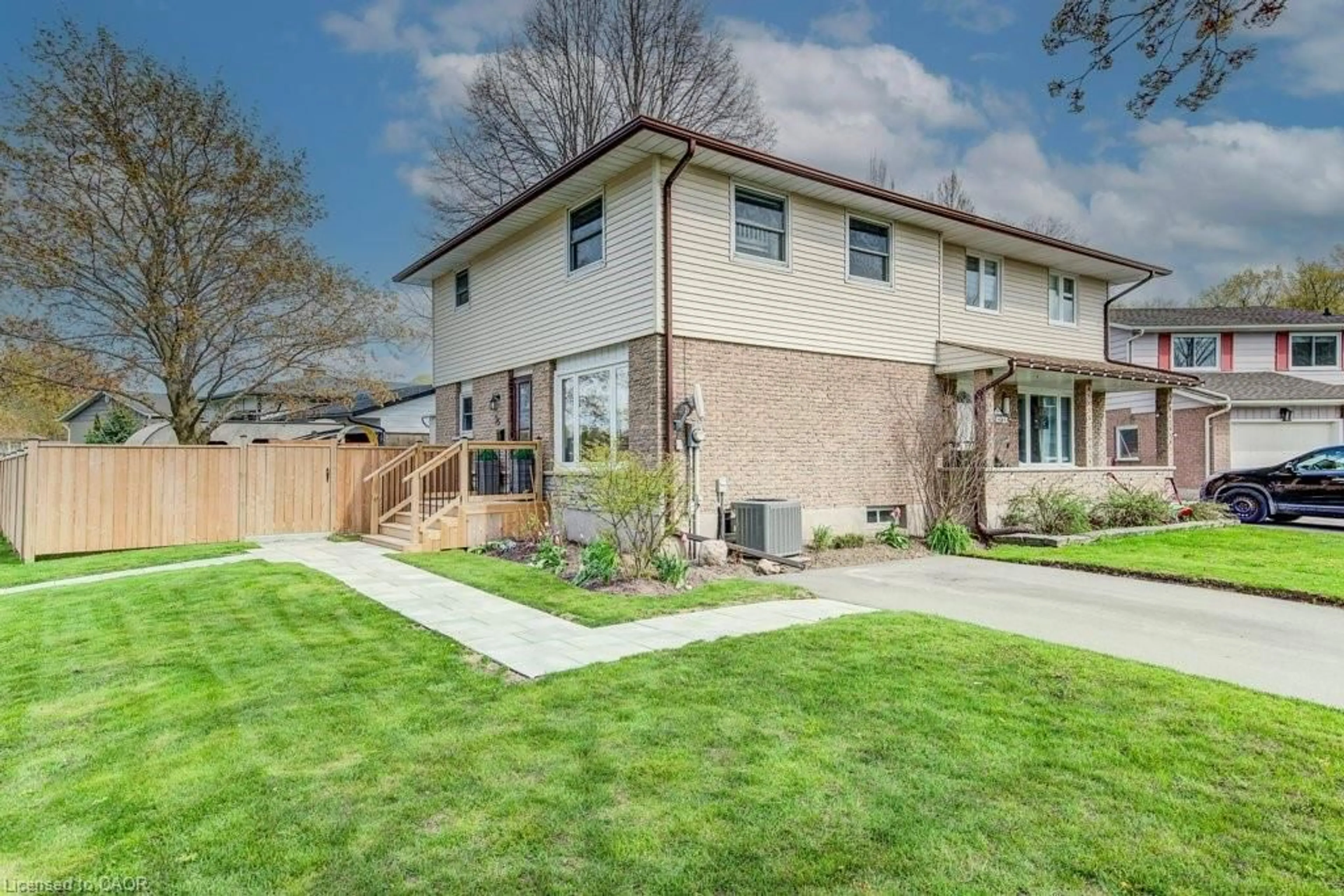 Home with brick exterior material, street for 35 Mockingbird Dr, Elmira Ontario N3B 3E4