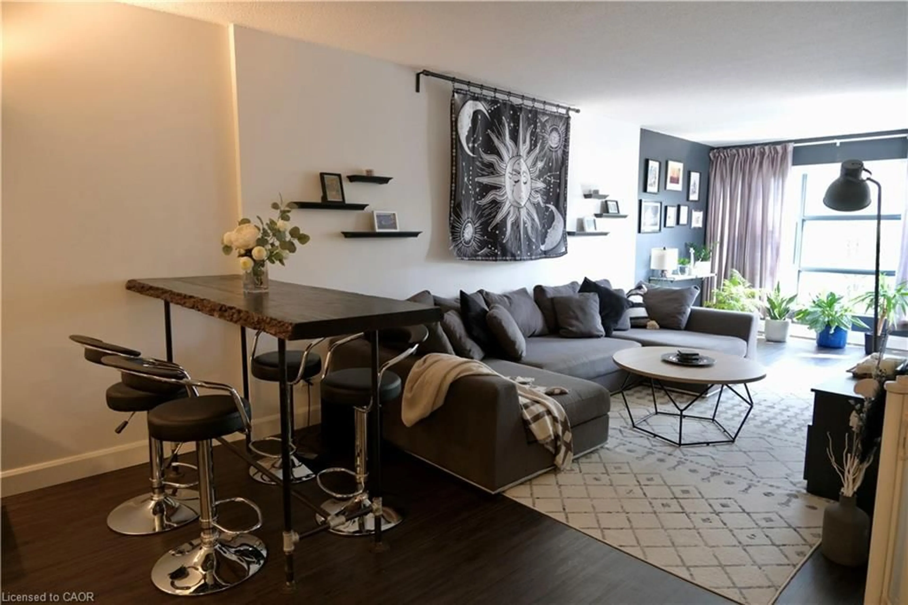 Living room with furniture, unknown for 175 Hunter St #301, Hamilton Ontario L8N 4E7