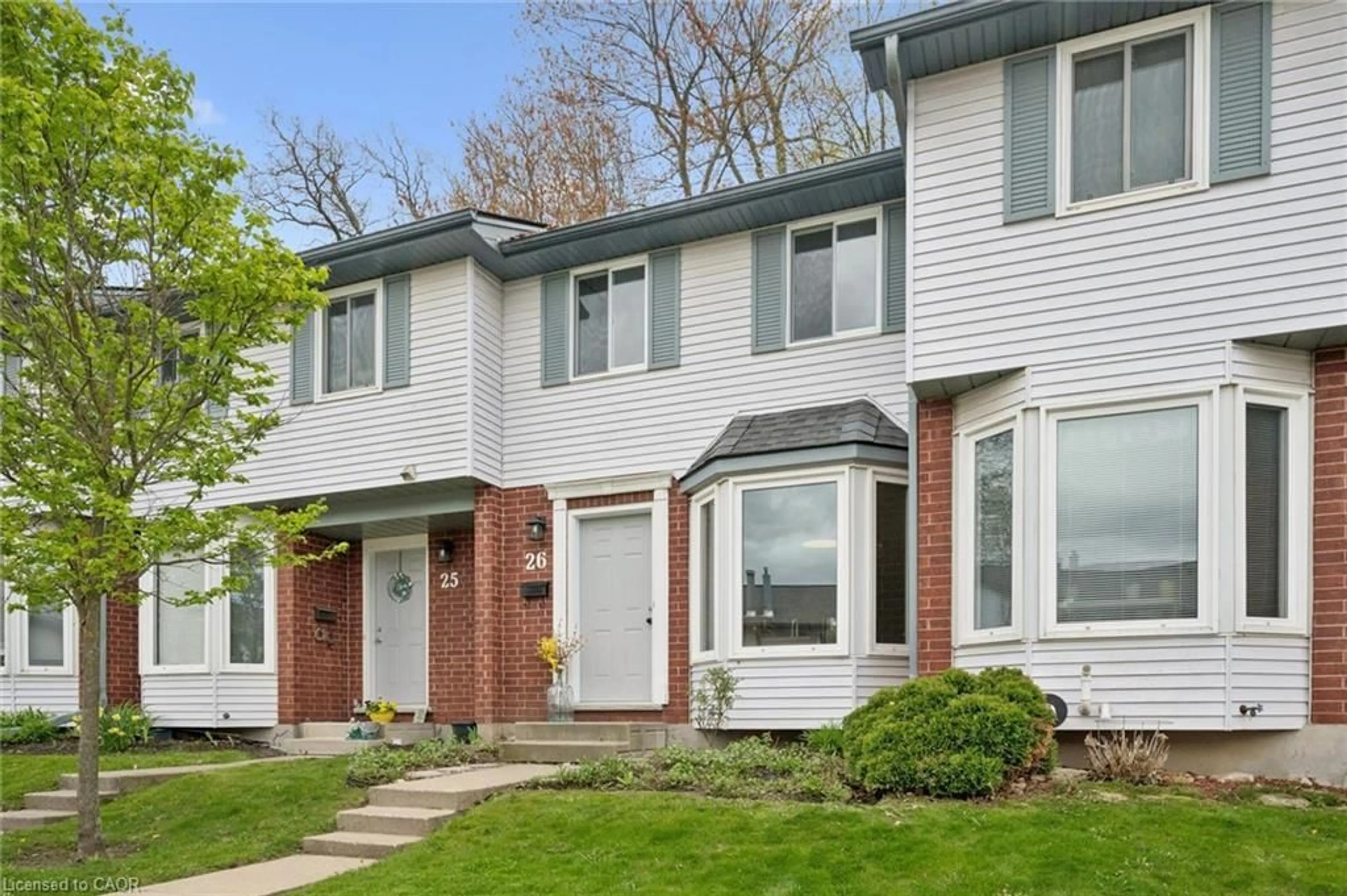 Home with brick exterior material, street for 219 Kingswood Dr #26, Kitchener Ontario N2E 3J4