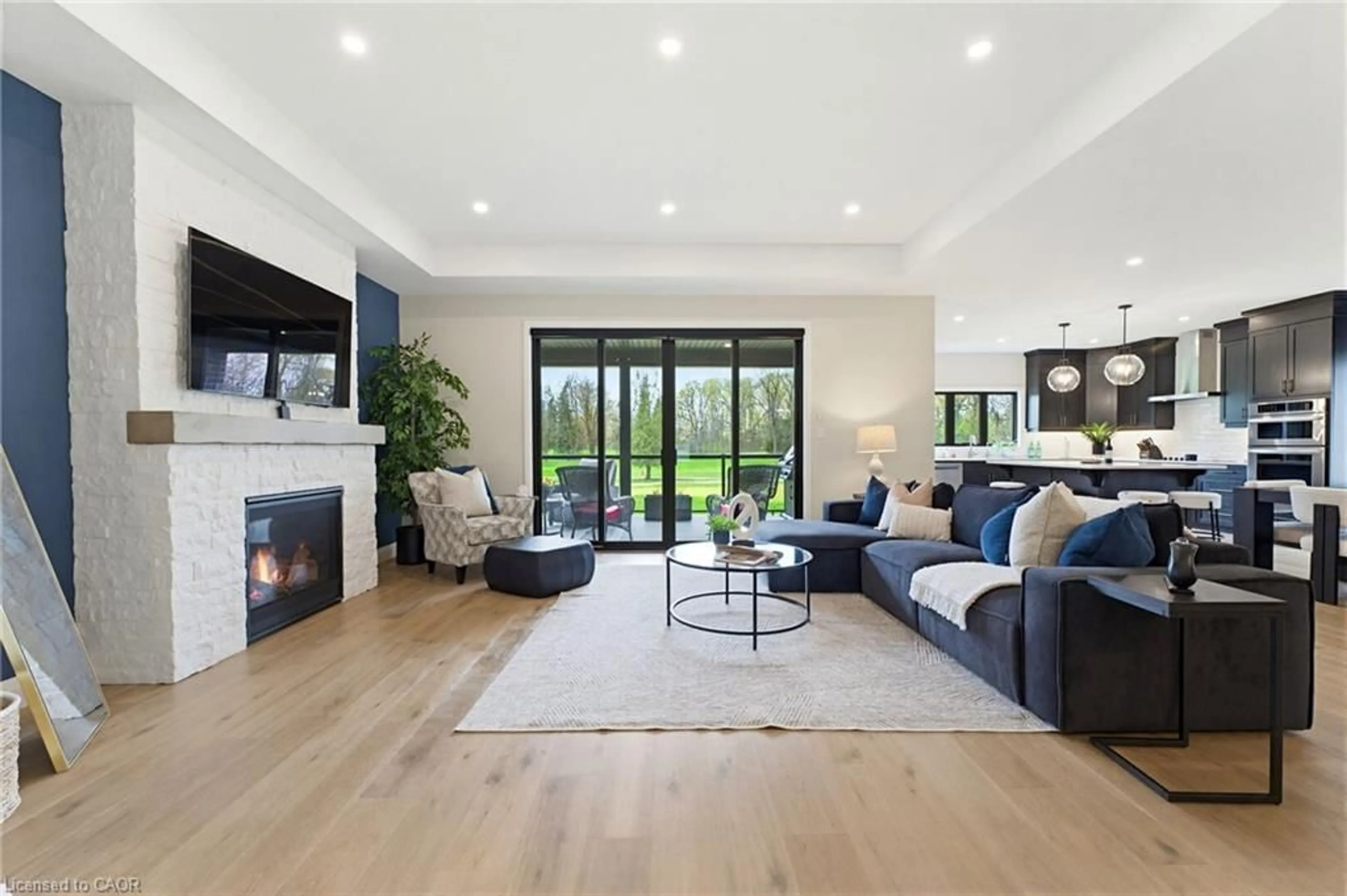 Living room with furniture, wood/laminate floor for 37 Gilmer Cres, Listowel Ontario N4W 0H3