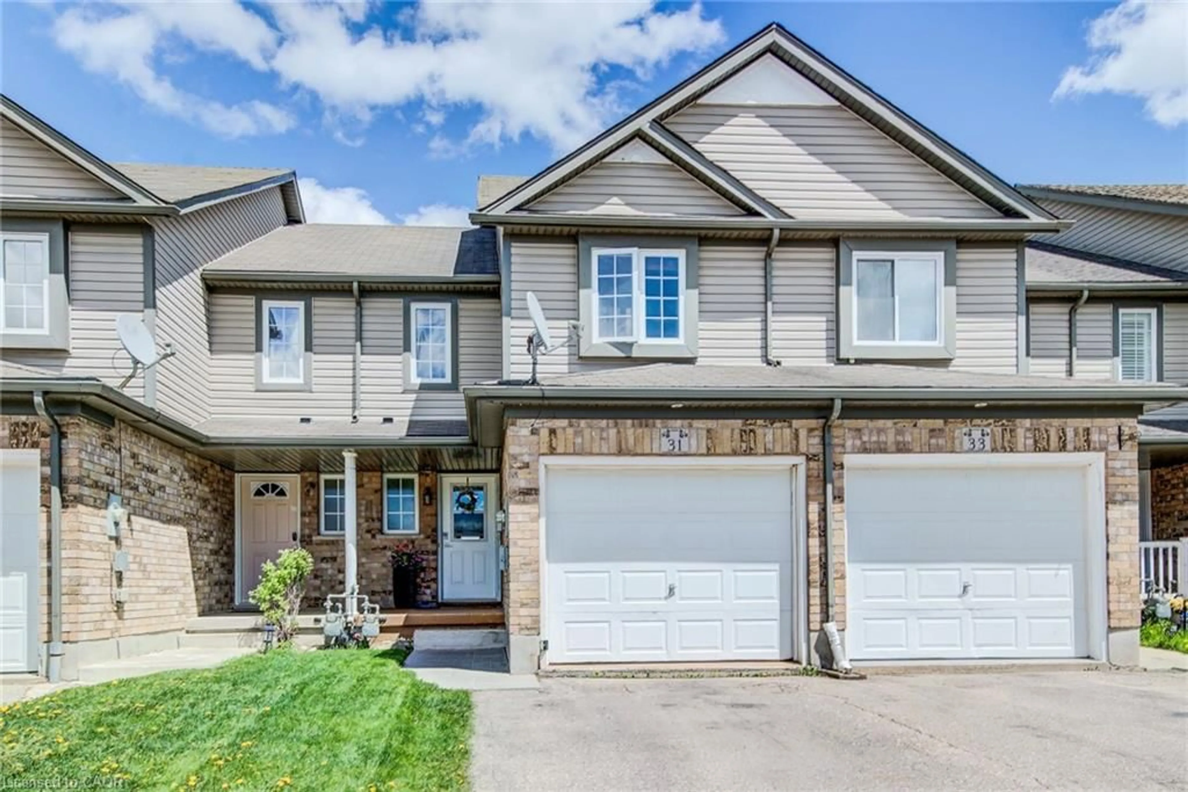 Home with brick exterior material, street for 31 Red Clover Cres, Kitchener Ontario N2E 4G8