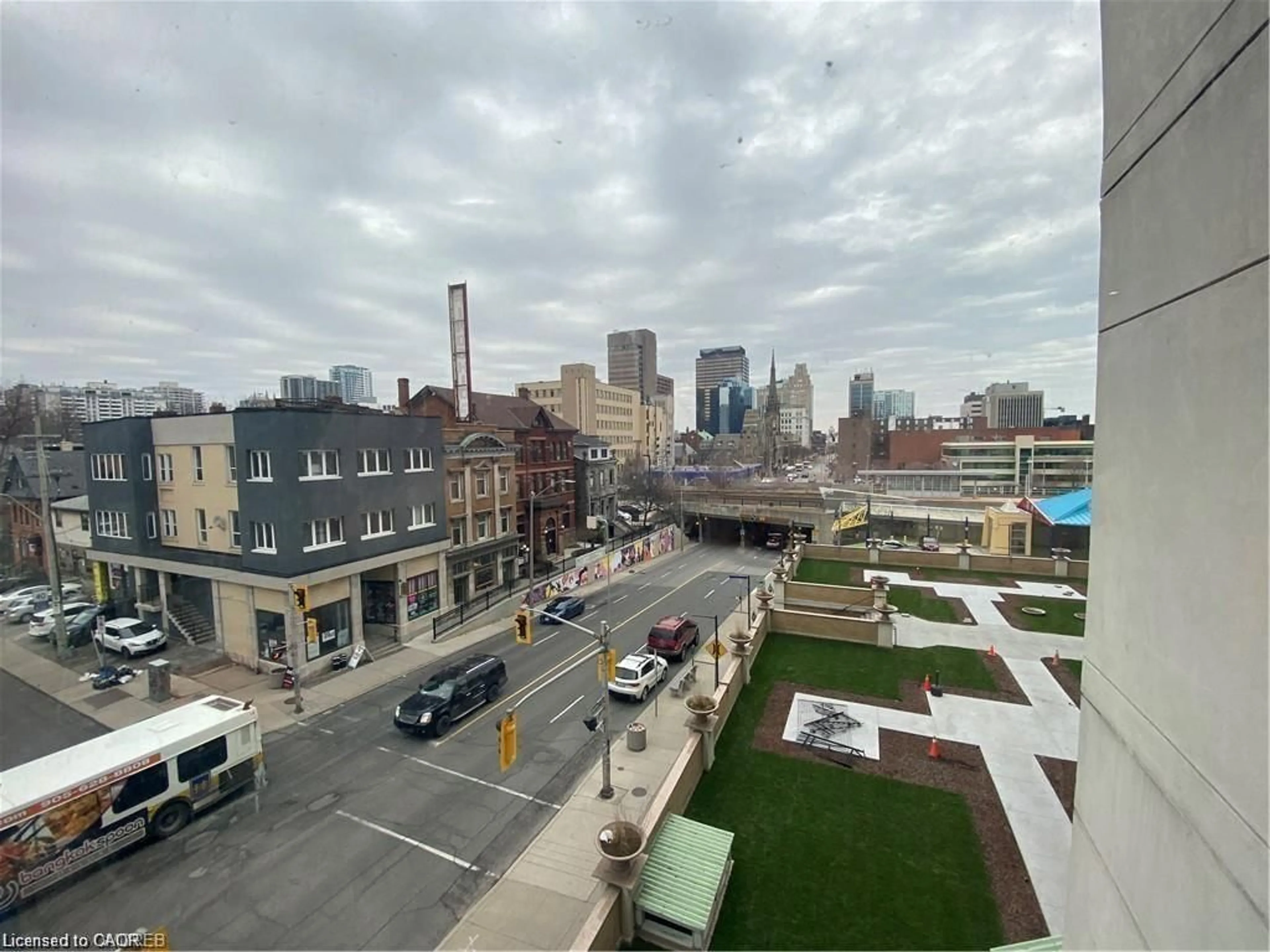 A pic from outside/outdoor area/front of a property/back of a property/a pic from drone, city buildings view from balcony for 135 James St #314, Hamilton Ontario L8P 2Z6