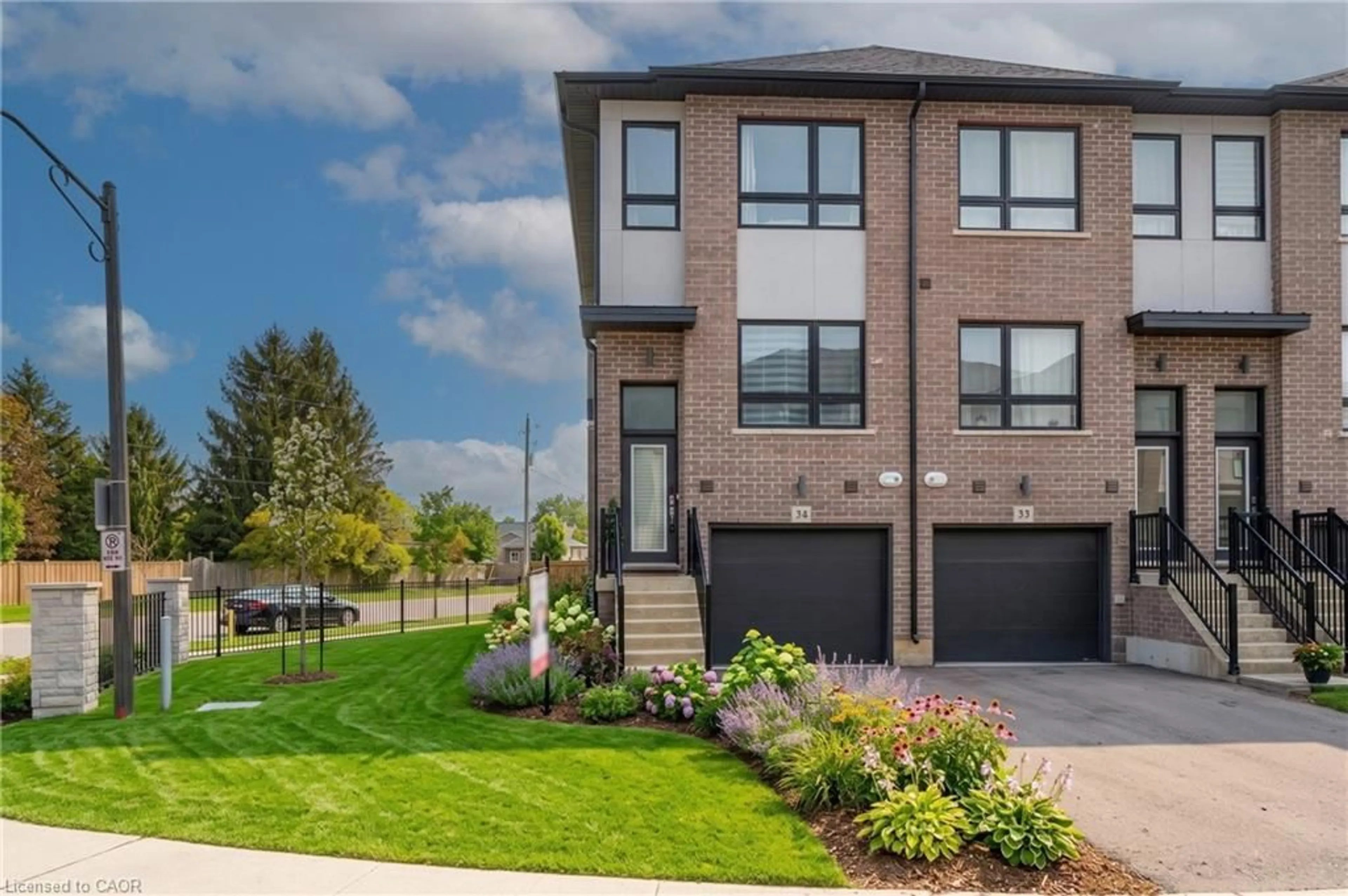 Home with brick exterior material, street for 720 Grey St #34, Brantford Ontario N3S 0K2