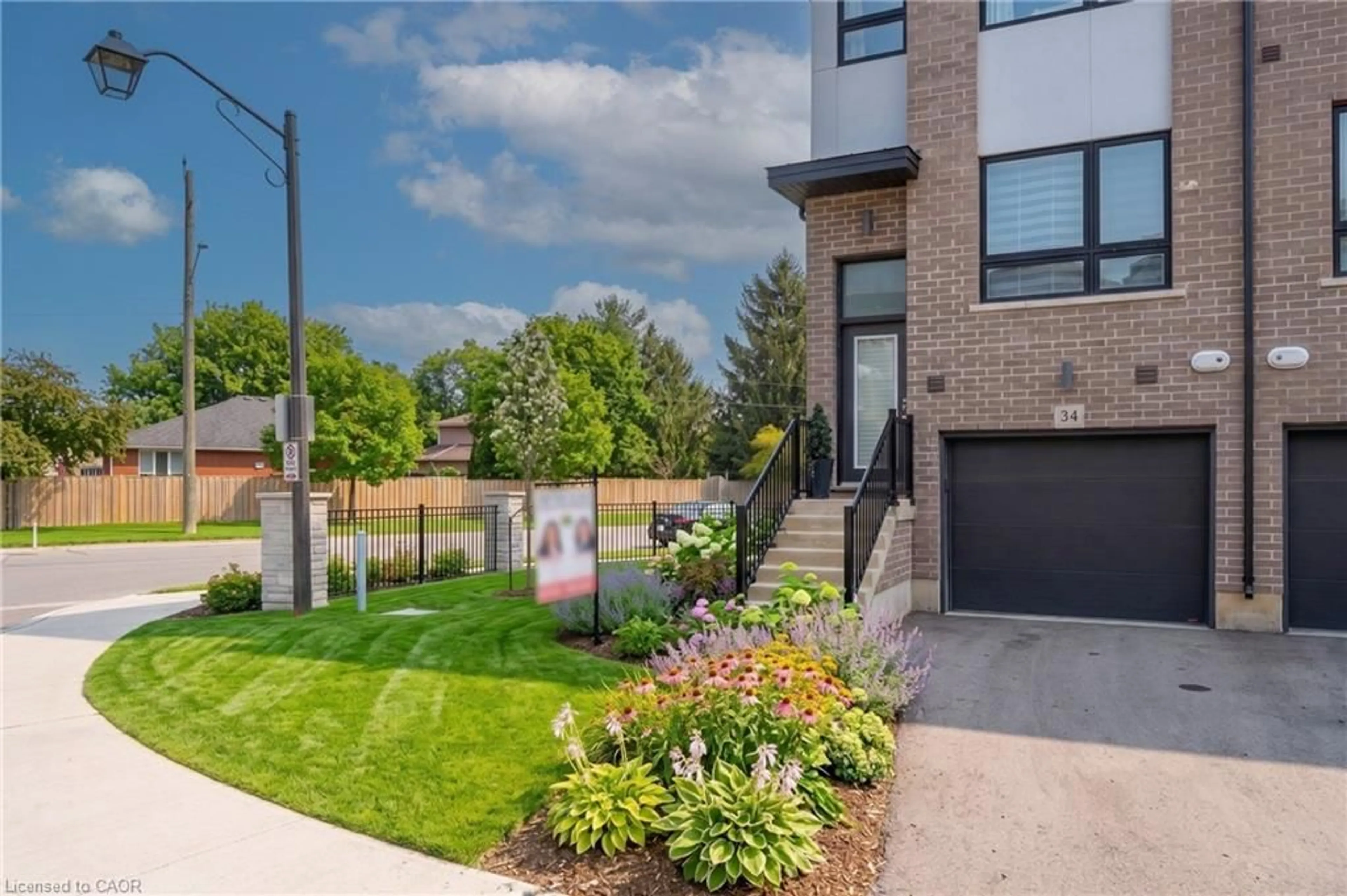 Home with brick exterior material, street for 720 Grey St #34, Brantford Ontario N3S 0K2