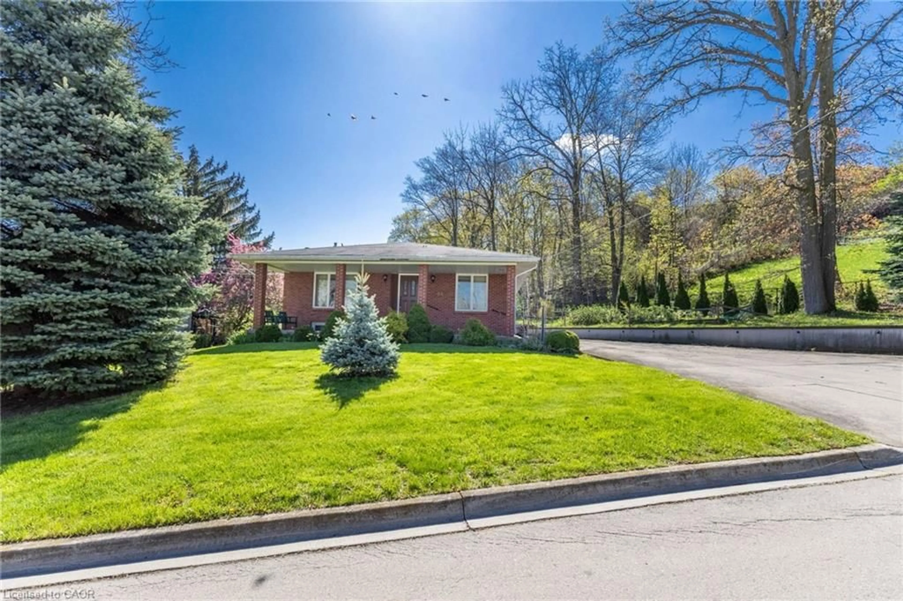 Home with brick exterior material, street for 84 Homeside Ave, Hamilton Ontario L8G 3H1
