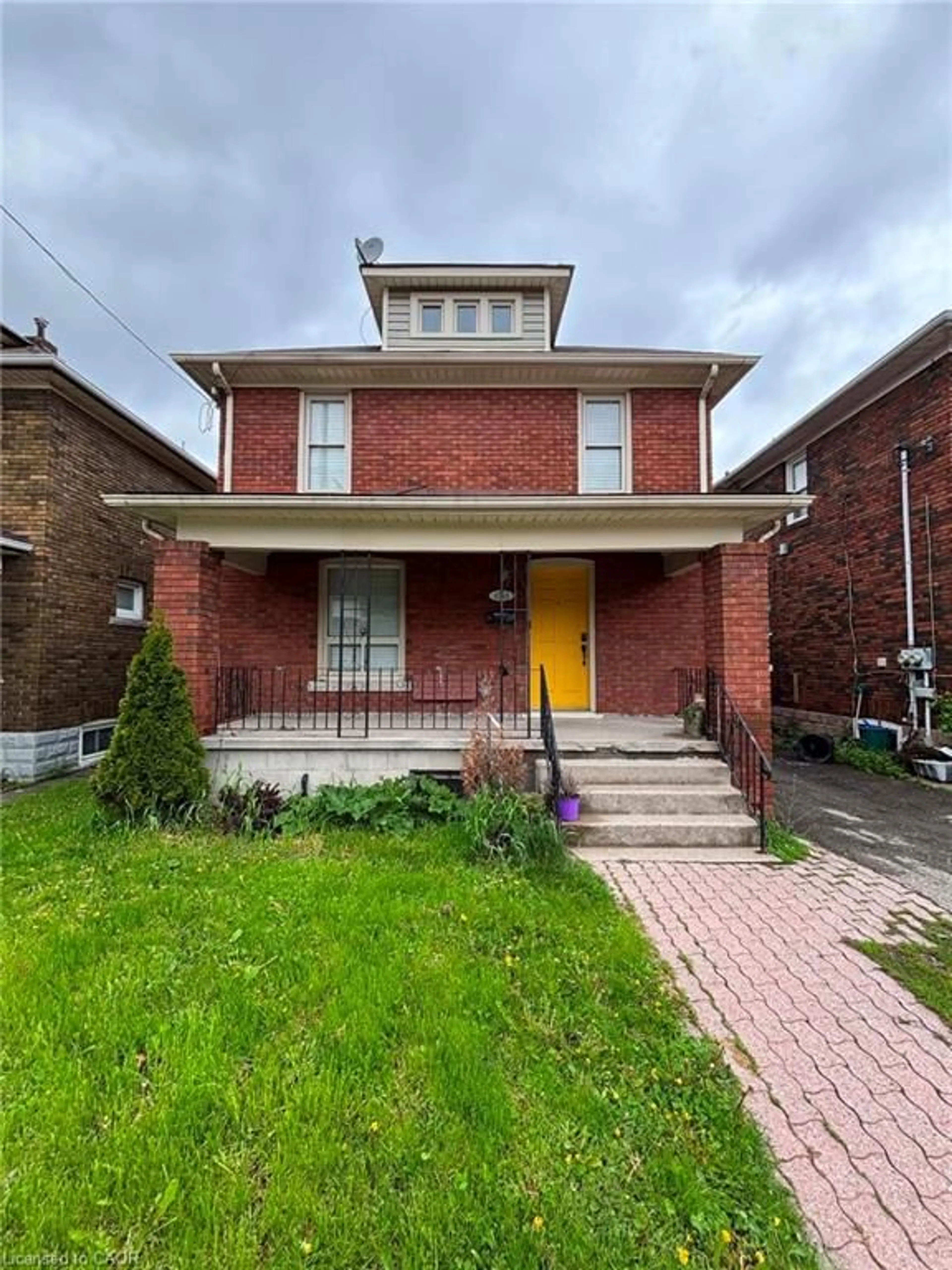 Home with brick exterior material, street for 4935 Willmott St, Niagara Falls Ontario L2E 1Z6