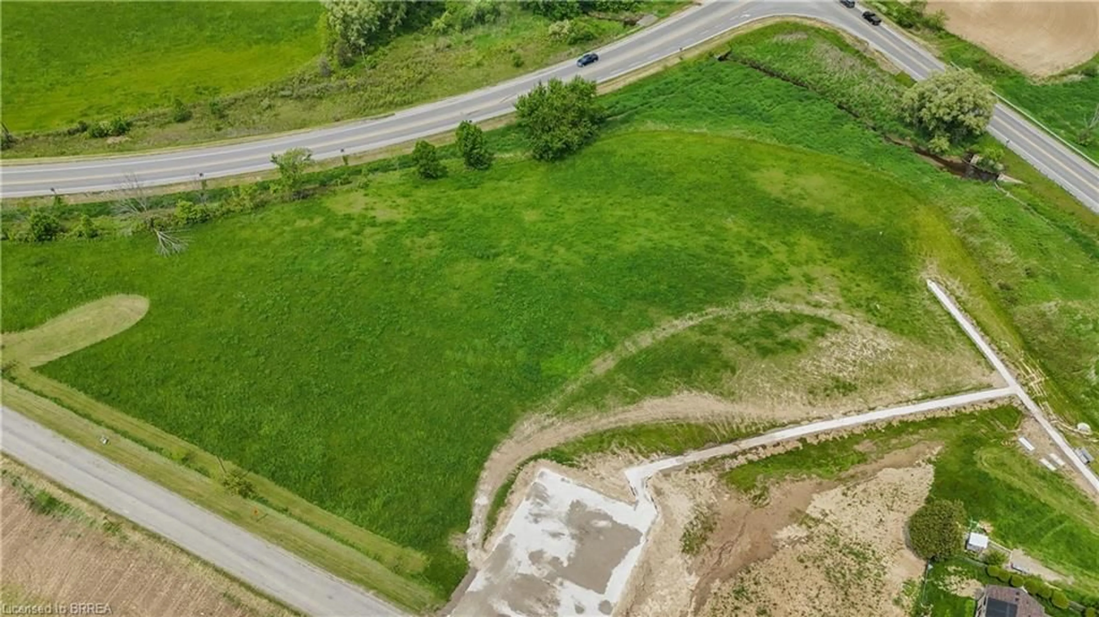 A pic from outside/outdoor area/front of a property/back of a property/a pic from drone, street for 8 Campbell Dr, Mount Pleasant Ontario N0E 1K0