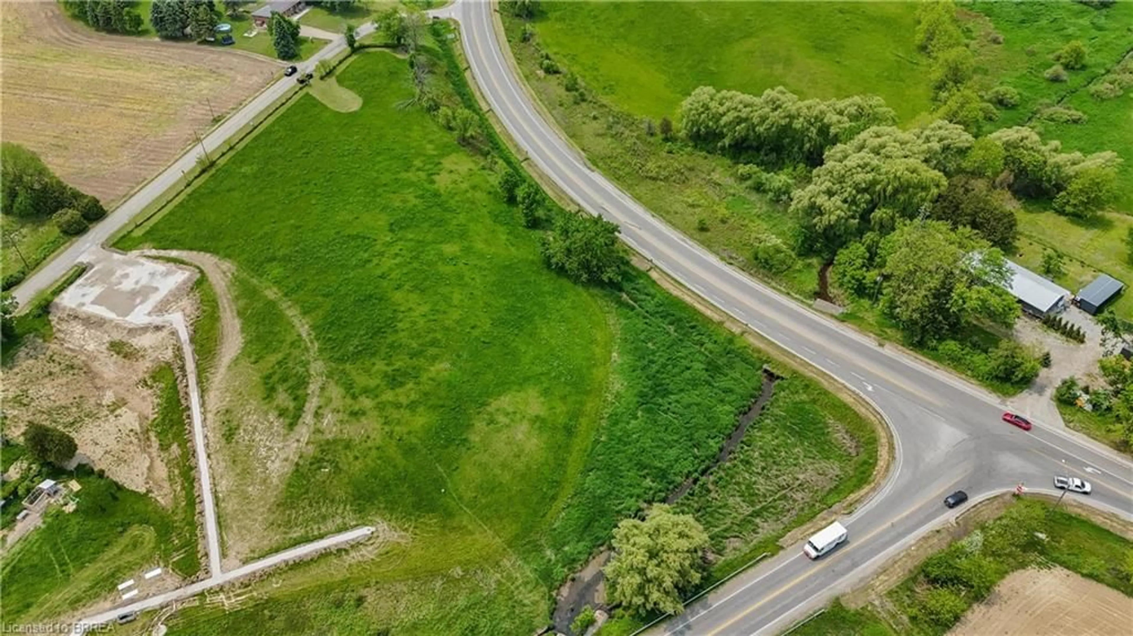 A pic from outside/outdoor area/front of a property/back of a property/a pic from drone, street for 8 Campbell Dr, Mount Pleasant Ontario N0E 1K0
