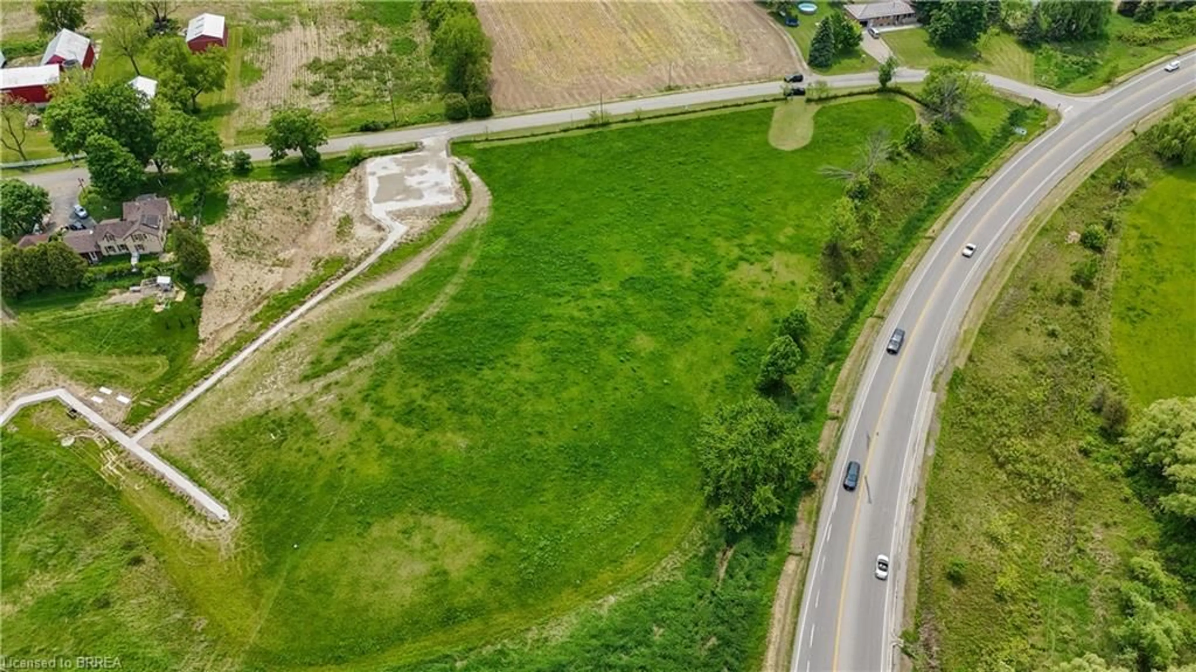 A pic from outside/outdoor area/front of a property/back of a property/a pic from drone, street for 8 Campbell Dr, Mount Pleasant Ontario N0E 1K0