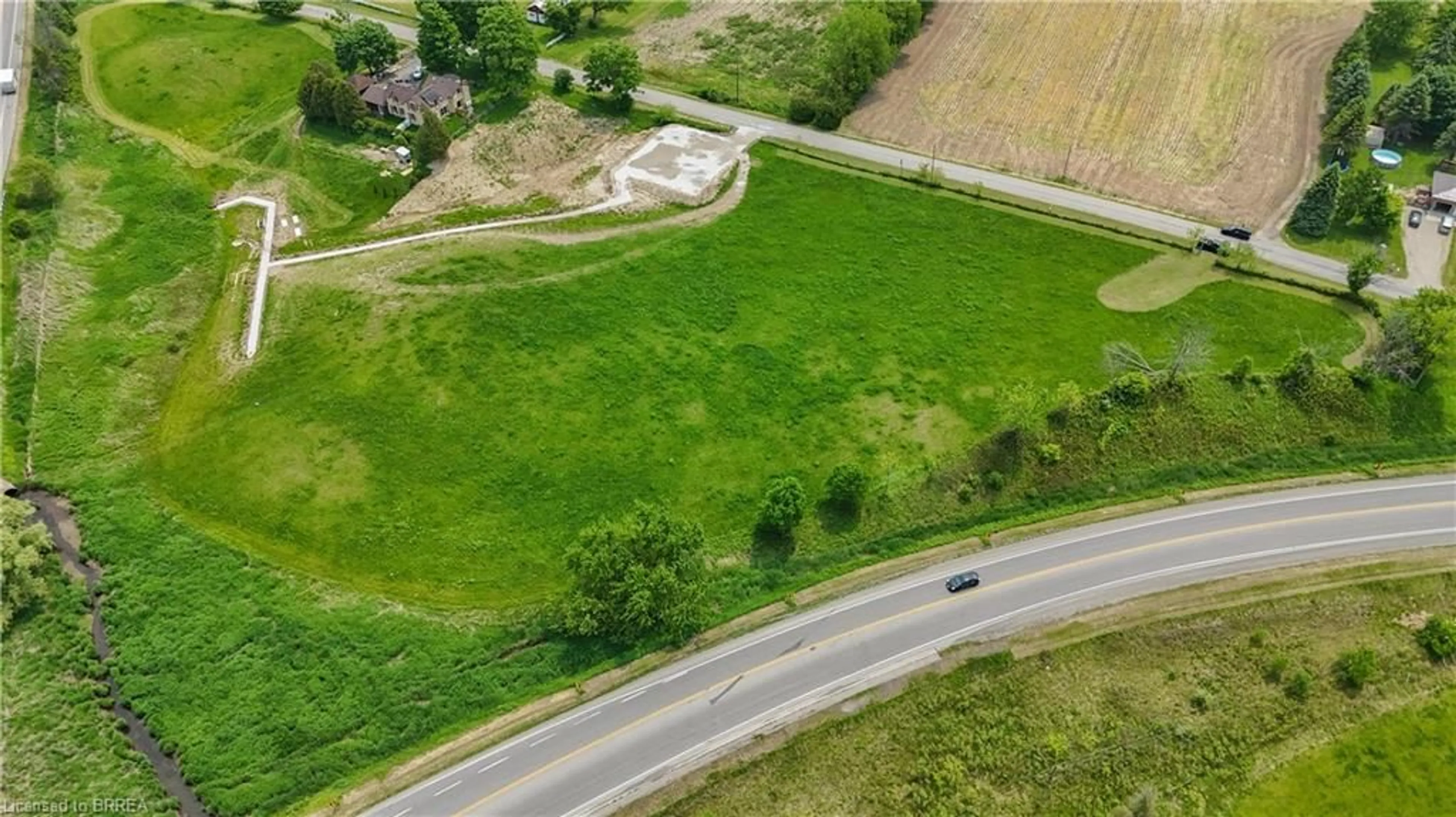 A pic from outside/outdoor area/front of a property/back of a property/a pic from drone, street for 8 Campbell Dr, Mount Pleasant Ontario N0E 1K0