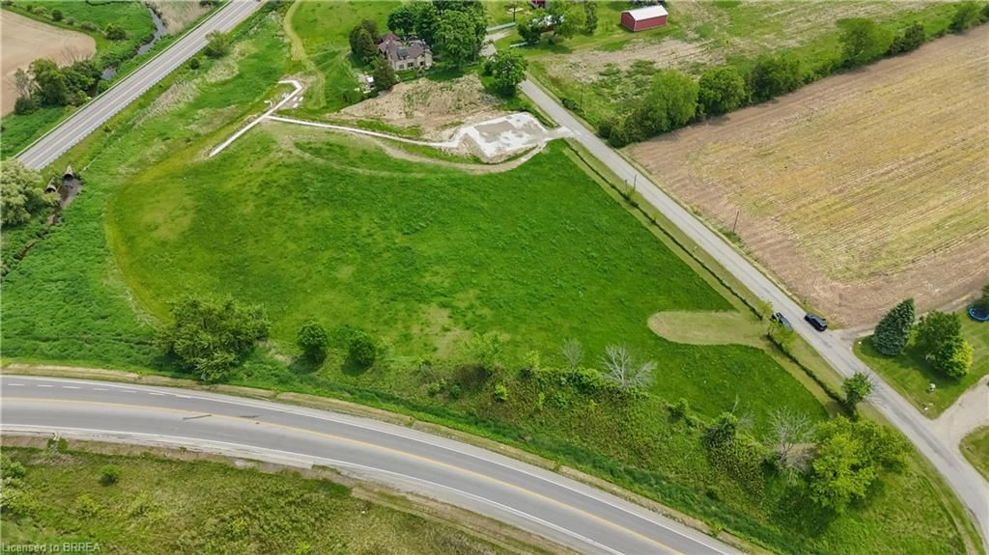 A pic from outside/outdoor area/front of a property/back of a property/a pic from drone, street for 8 Campbell Dr, Mount Pleasant Ontario N0E 1K0
